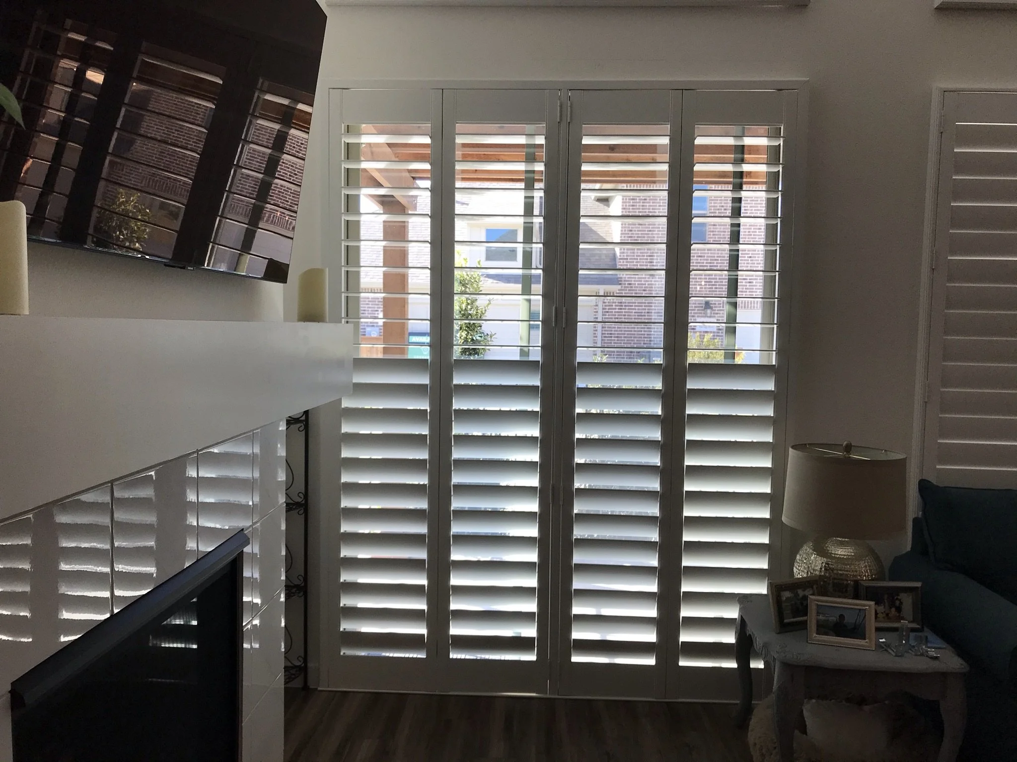 4 1/2" Clearview bi-fold wood shutter for sliding glass door, painted SW Pure White, 1 t-post, 4 panels.