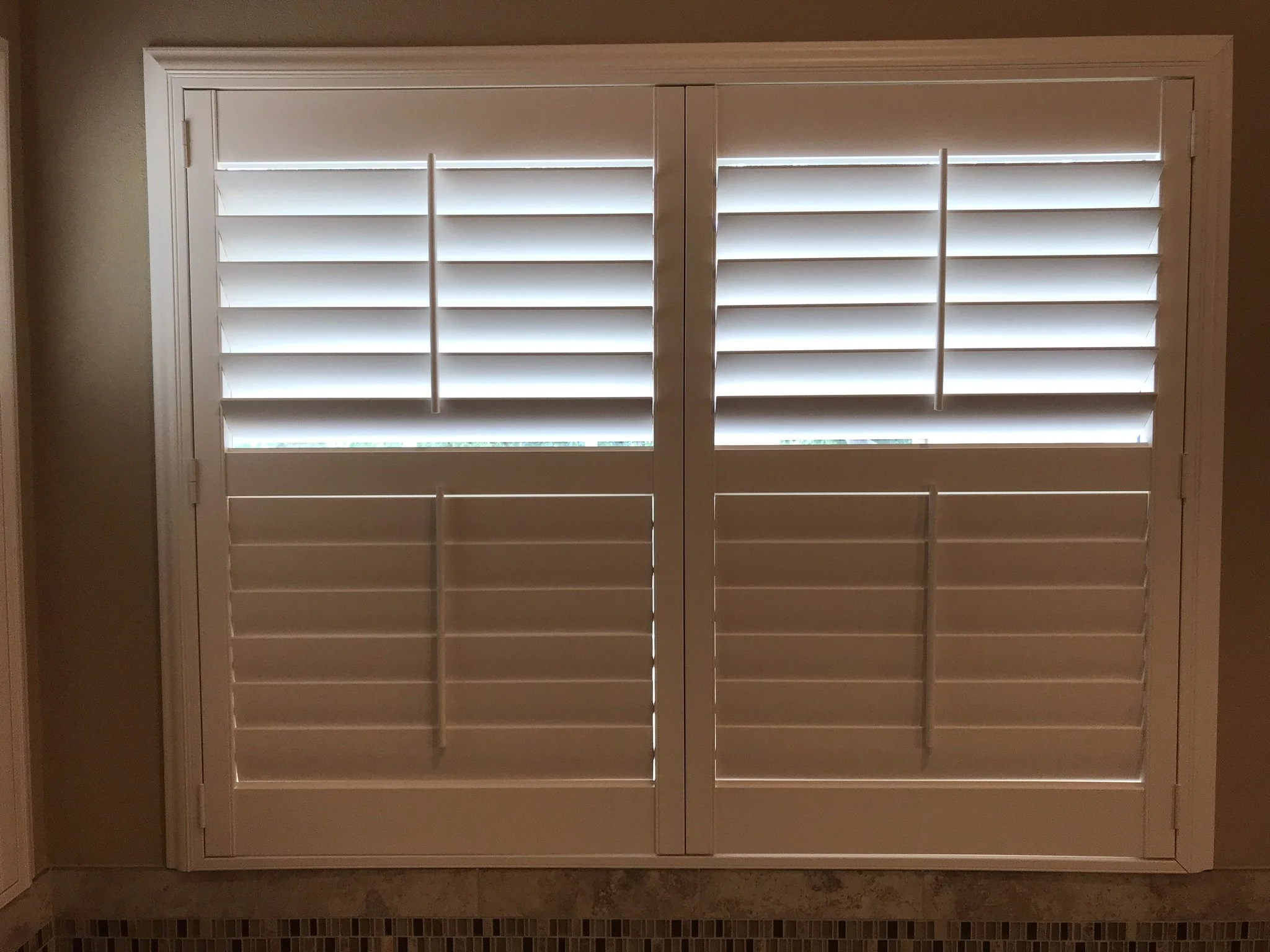 Hunter Douglas Palm Beach Polysatin Vinyl Shutters, 3 1/2" louvers, White Silk, divider rails, front tilt rods, Colonial Z frame, 1 panel and 2 panels, faux shutters.
