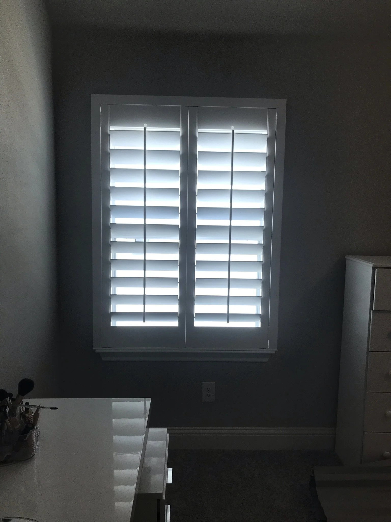 Custom wood shutters with front tilt rods, 4 1/2" louvers, painted, no divider rail.