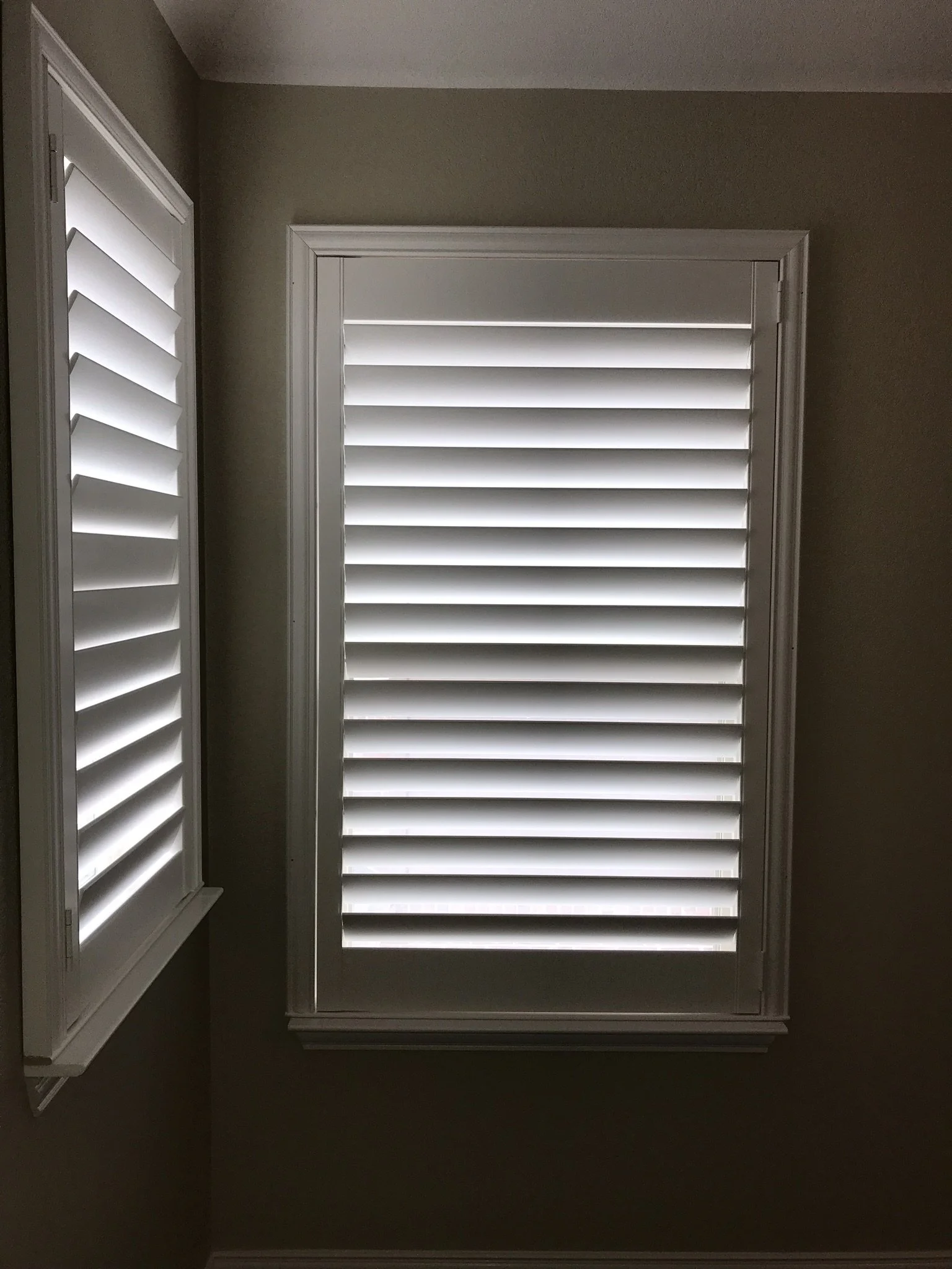 Custom wood shutters with Clearview (no tilt rods), Sherwin Williams Extra White, Belair master and z frame, 3 1/2" louvers, splits @ 50%, 1 panel.