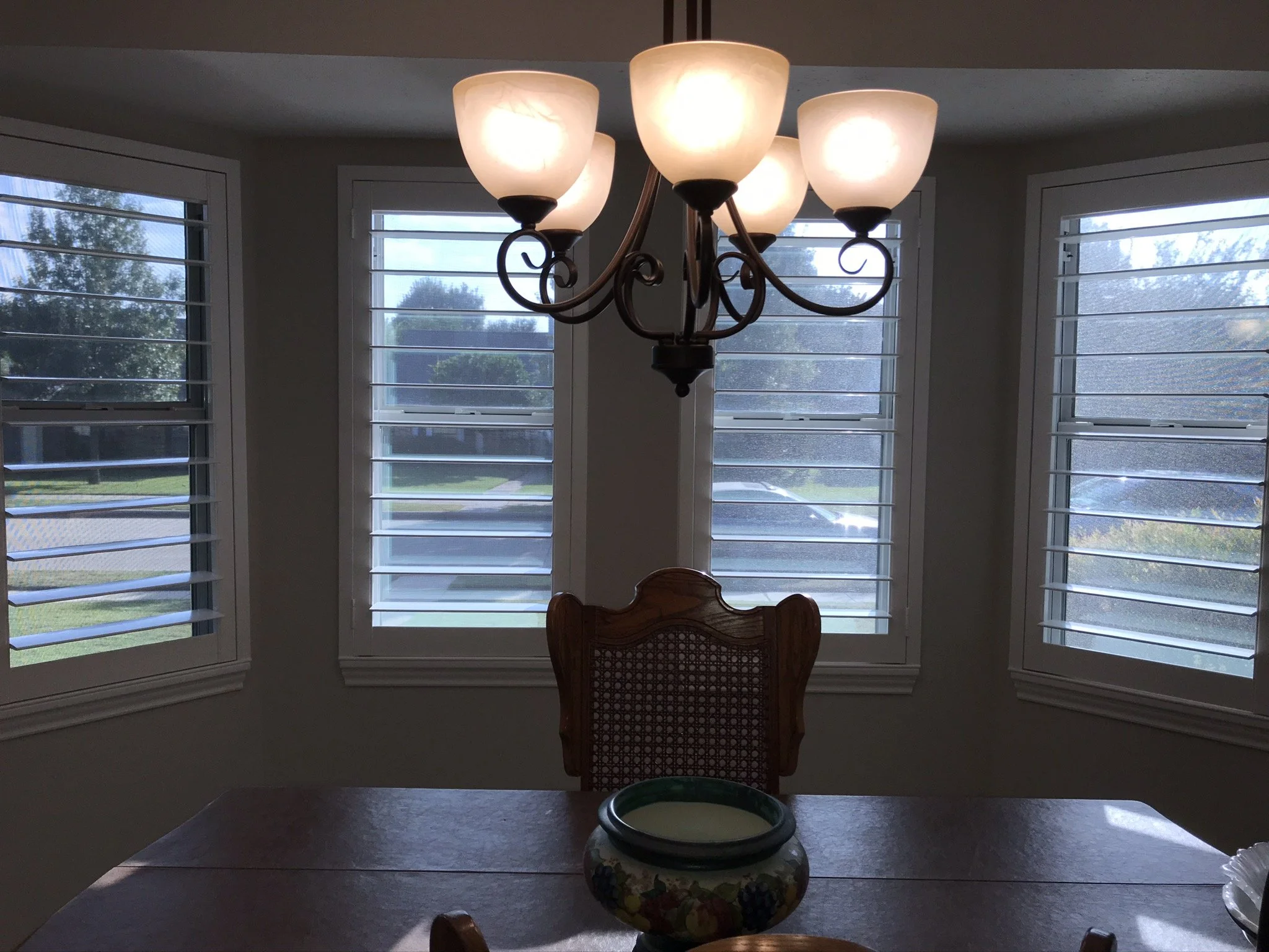 Custom wood plantation shutters with clearview (rear hidden tilt), 4 1/2" louvers, painted SW Pure White semi-gloss, 1.5" flat master frame and Z frame, no splits.  1 panel.