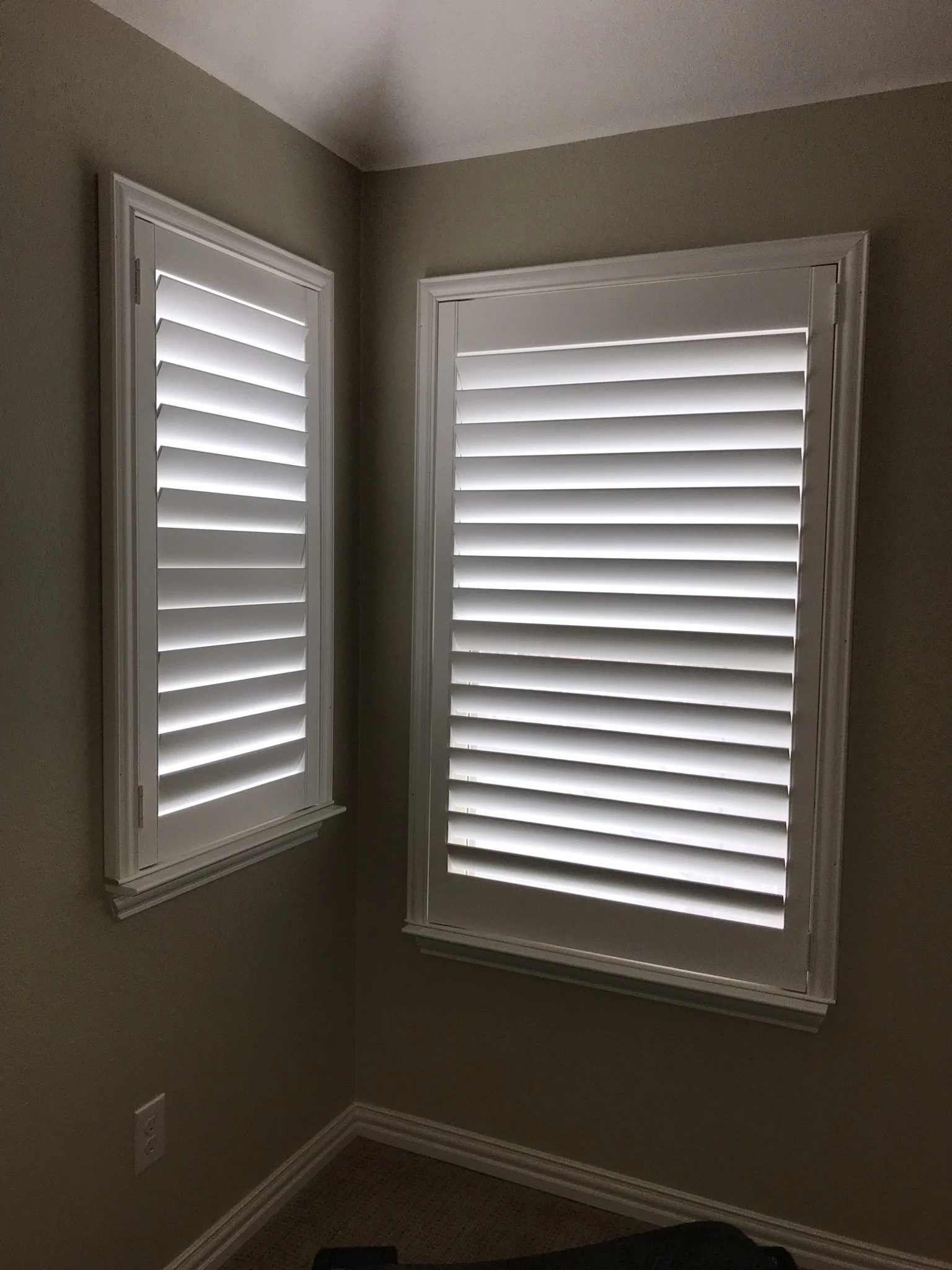 Custom wood shutters with Clearview (no tilt rods), Sherwin Williams Extra White, Belair master and z frame, 3 1/2" louvers, splits @ 50%, 1 panel.