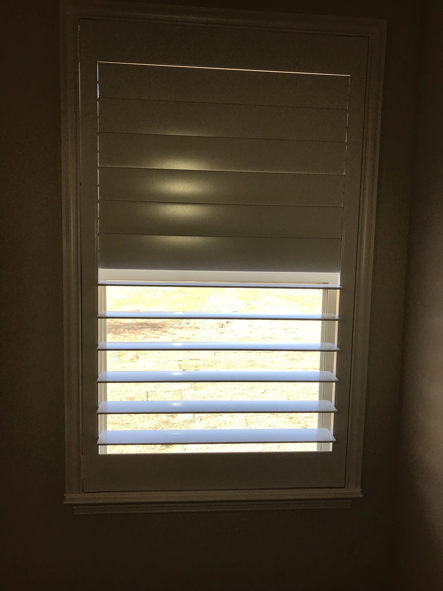 Custom wood shutter with rear tilt rod (clearview), painted white, splits at sash, no cdr.