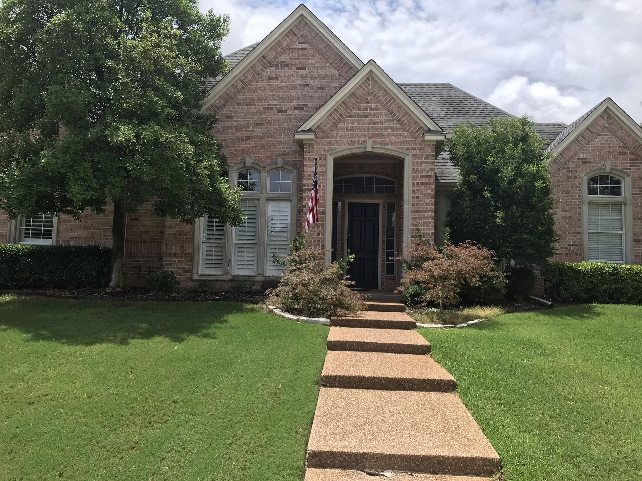 Custom Wood Shutters with Clearview (no tilt rod), 4 1/2" louvers, painted SW Extra White semi-gloss, beaded L frame, no divider rails, rear tilt split, 1 panel each.  Outside view.