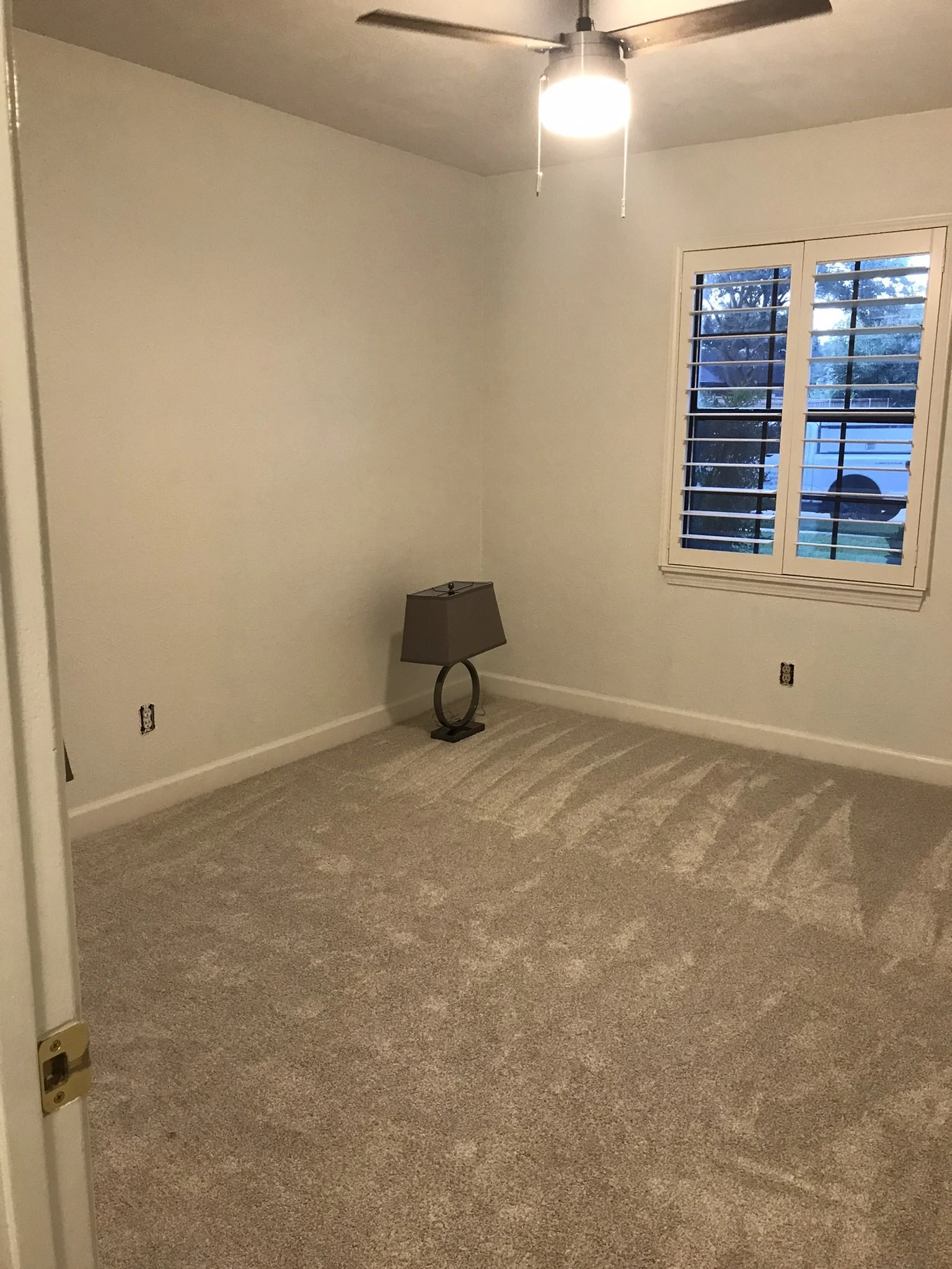 Custom Wood Shutters with Clearview (no tilt rod), 4 1/2" louvers, painted SW Extra White semi-gloss, San Antonio master frame, no divider rails, rear tilt split, 2 panels.