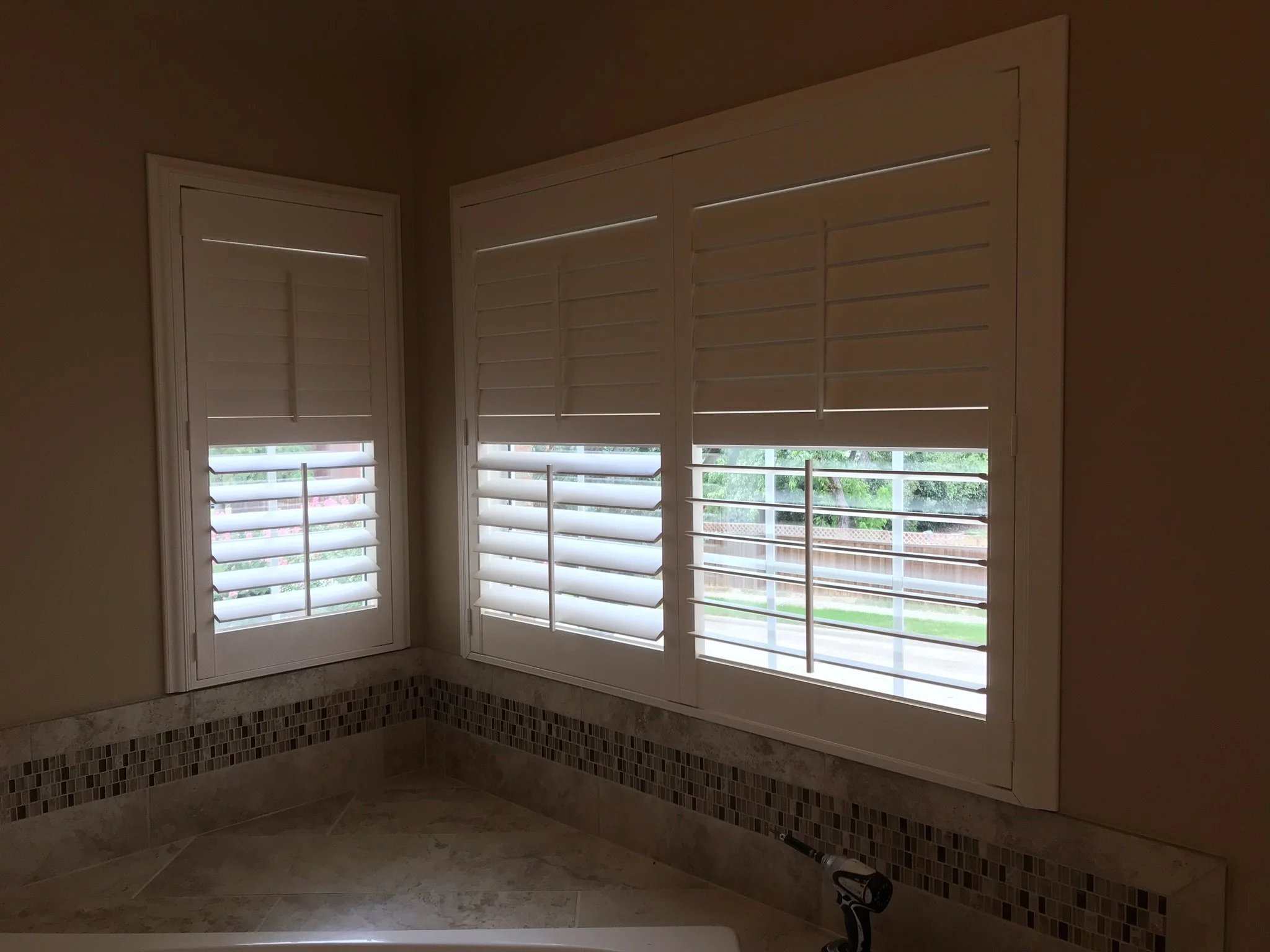 Hunter Douglas Palm Beach Polysatin Vinyl Shutters, 3 1/2" louvers, White Silk, divider rails, front tilt rods, Colonial Z frame, 1 panel and 2 panels, faux shutters.