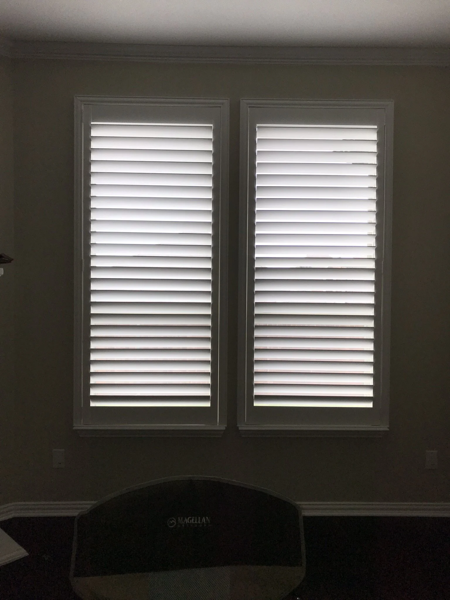 Custom wood shutters with Clearview (no tilt rods), Sherwin Williams Extra White, Belair master and z frame, 3 1/2" louvers, splits @ 50%, 1 panel.