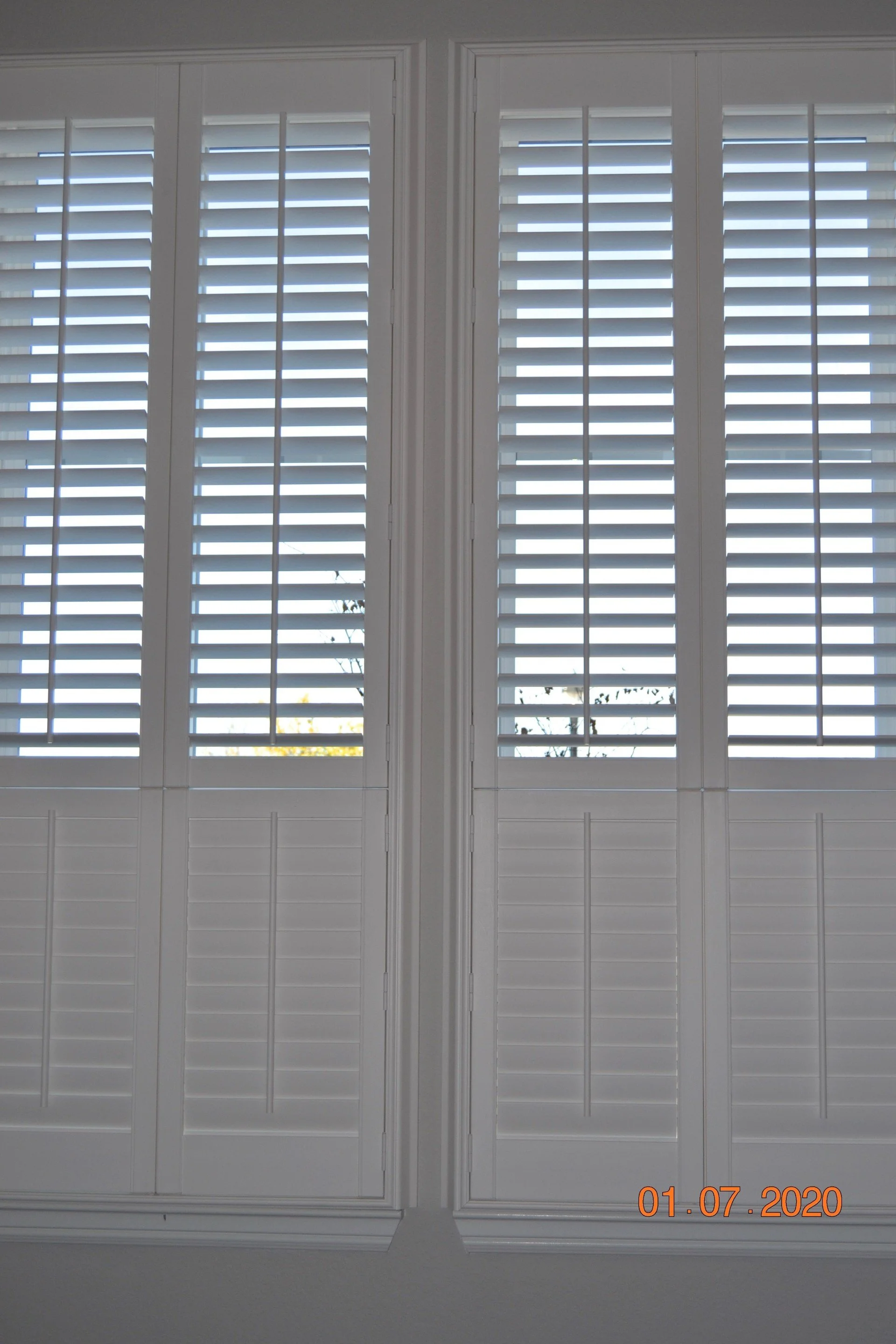 Hunter Douglas Palm Beach Polysatin Vinyl Shutters, double hung, bright white, deluxe casing frame, modern z frame, 2 1/2" louvers with front tilt, 2 panels.