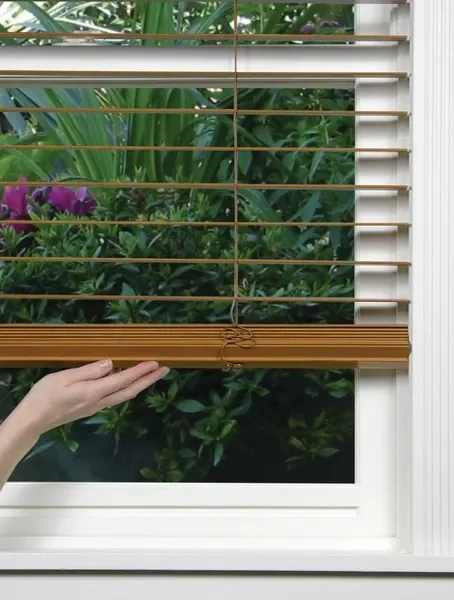 Hunter Douglas stained 2" Parkland Wood blinds with LiteRise cordless lift.