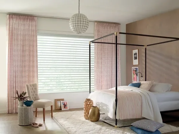 Hunter Douglas white Pirouette with PowerView motorization.