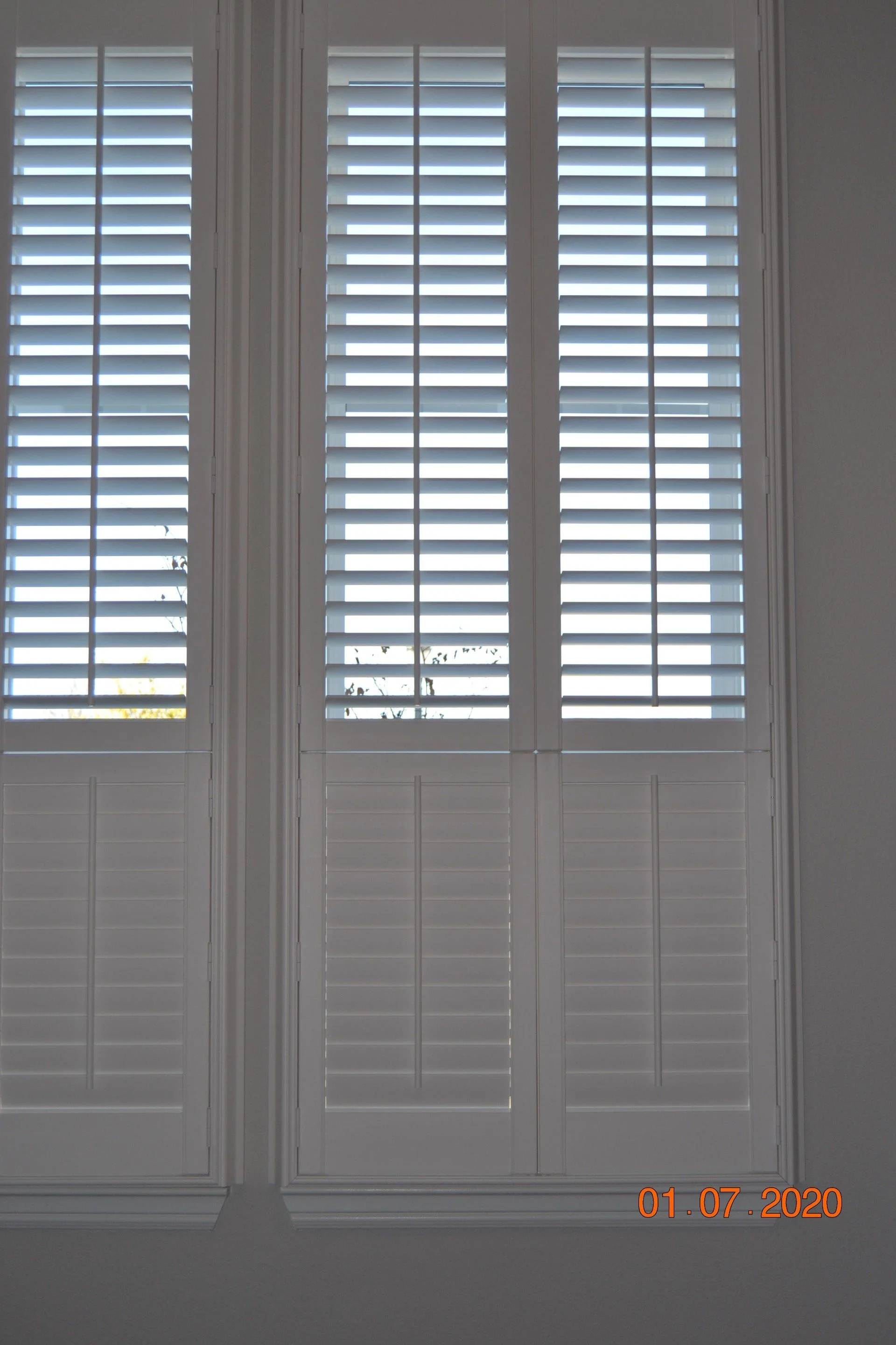 Hunter Douglas Palm Beach Polysatin Vinyl Shutters, double hung, bright white, deluxe casing frame, modern z frame, 2 1/2" louvers with front tilt, 2 panels.