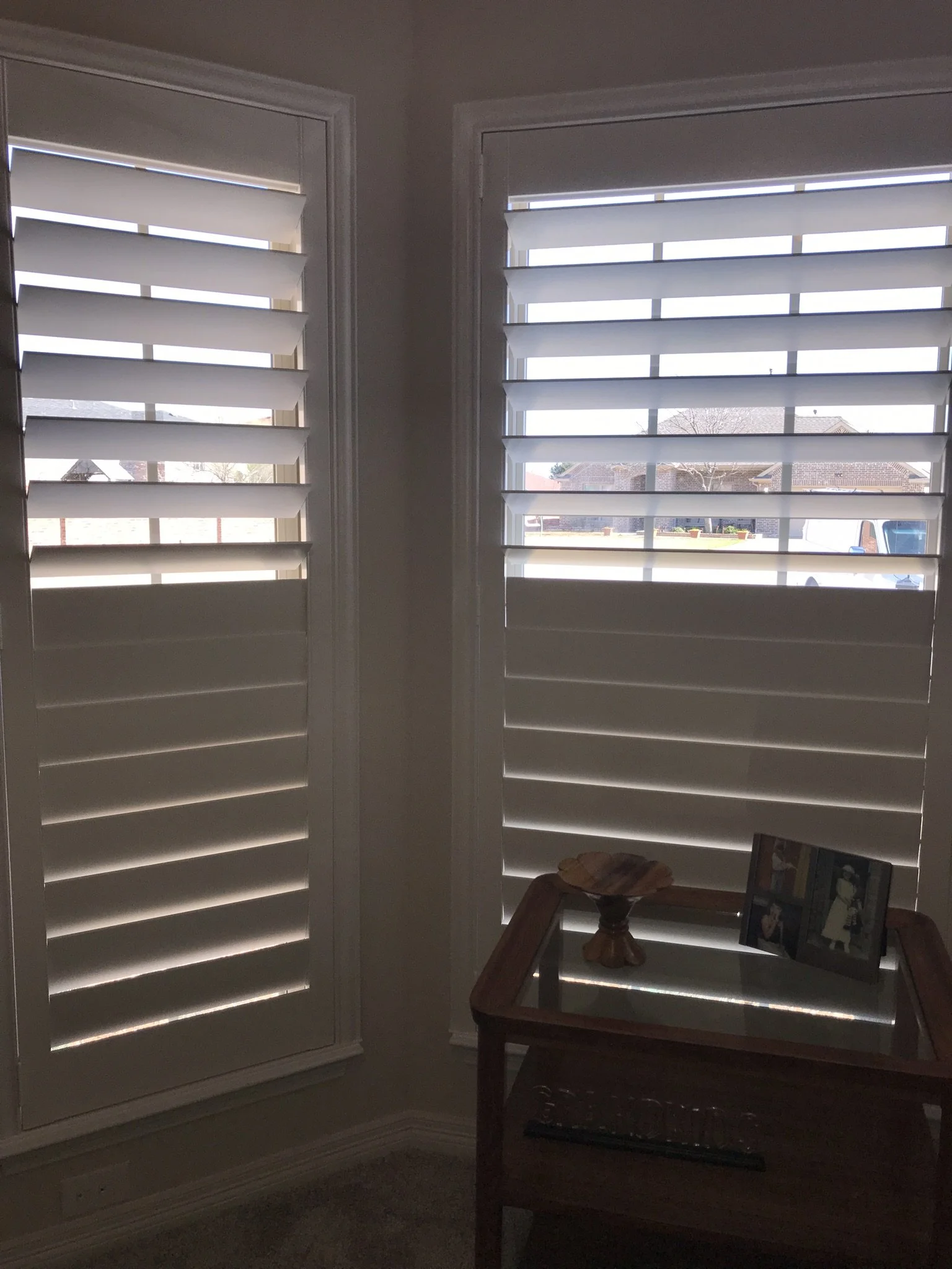 Custom wood shutter with rear tilt rod (clearview), painted white, splits at sash, no cdr.