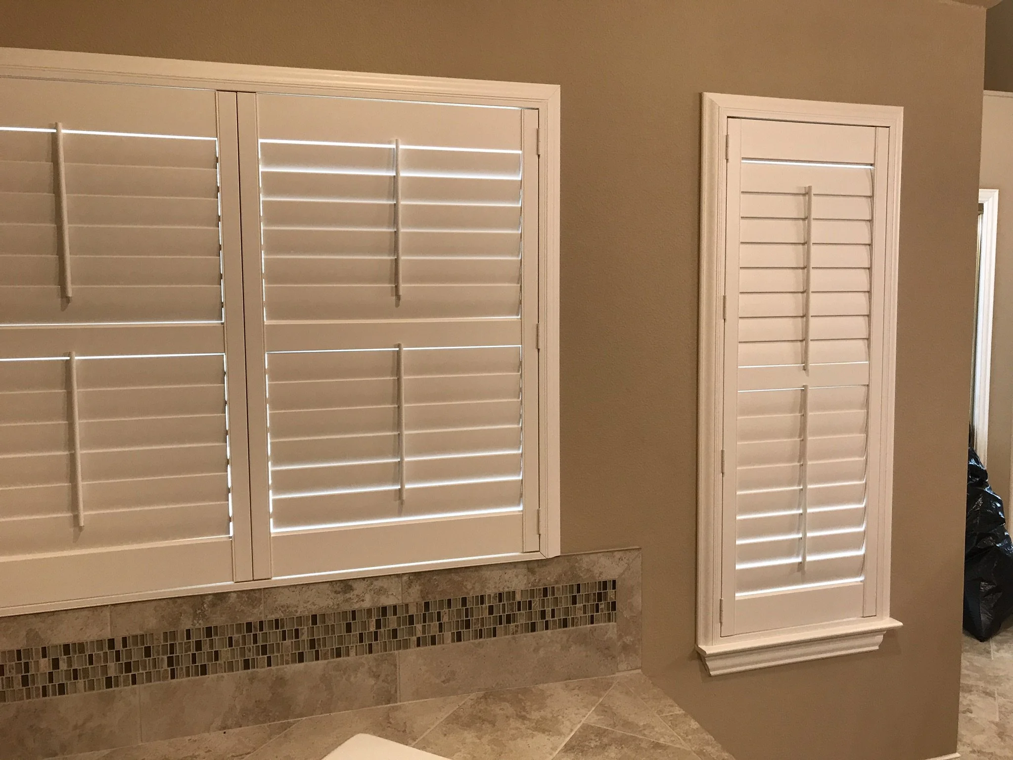 Hunter Douglas Palm Beach Polysatin Vinyl Shutters, 3 1/2" louvers, White Silk, divider rails, front tilt rods, Colonial Z frame, 1 panel and 2 panels, faux shutters.