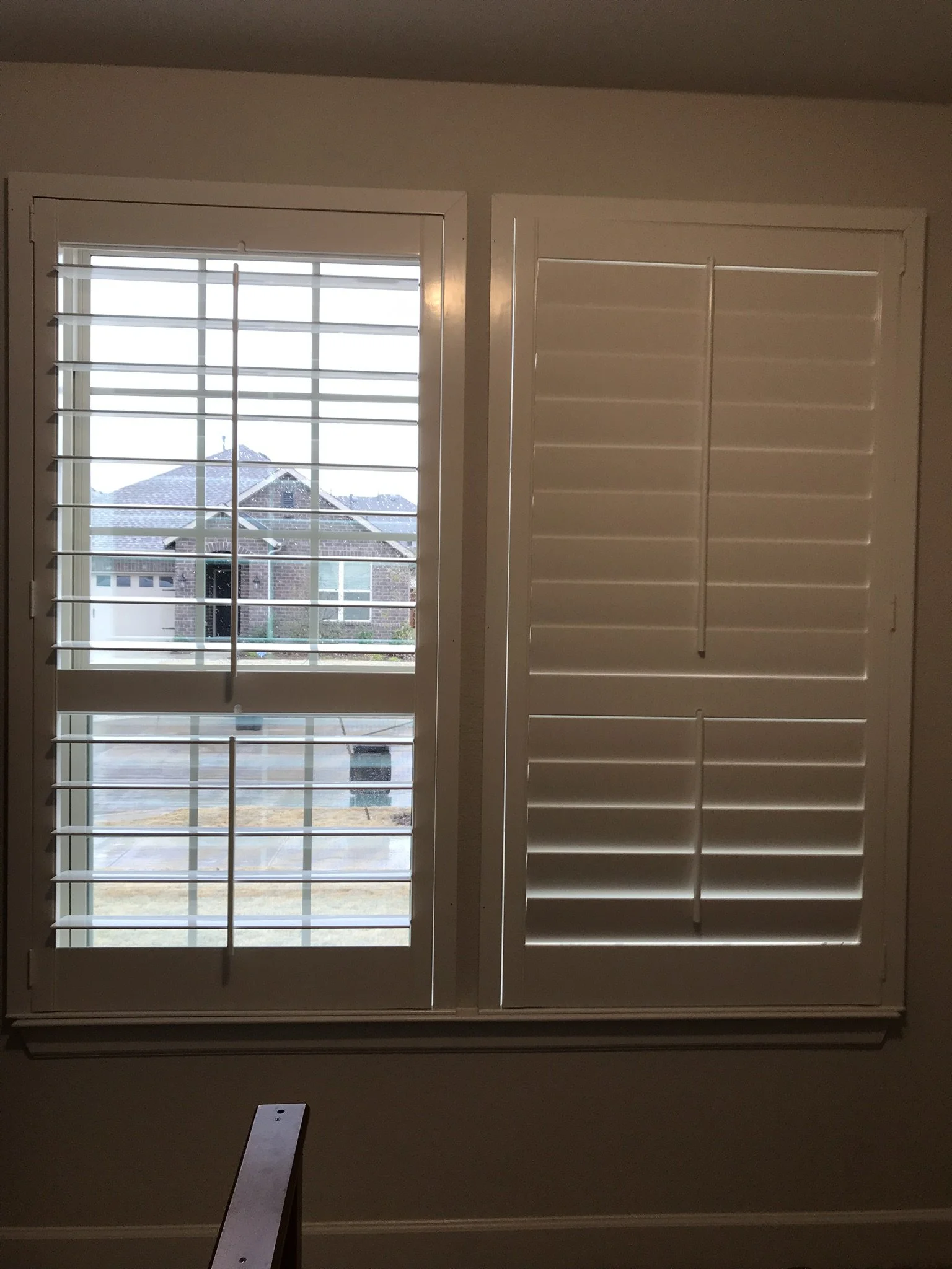 Wood Shutters with tilt rods, painted white, flat master frame, divider rails, 1 panel.