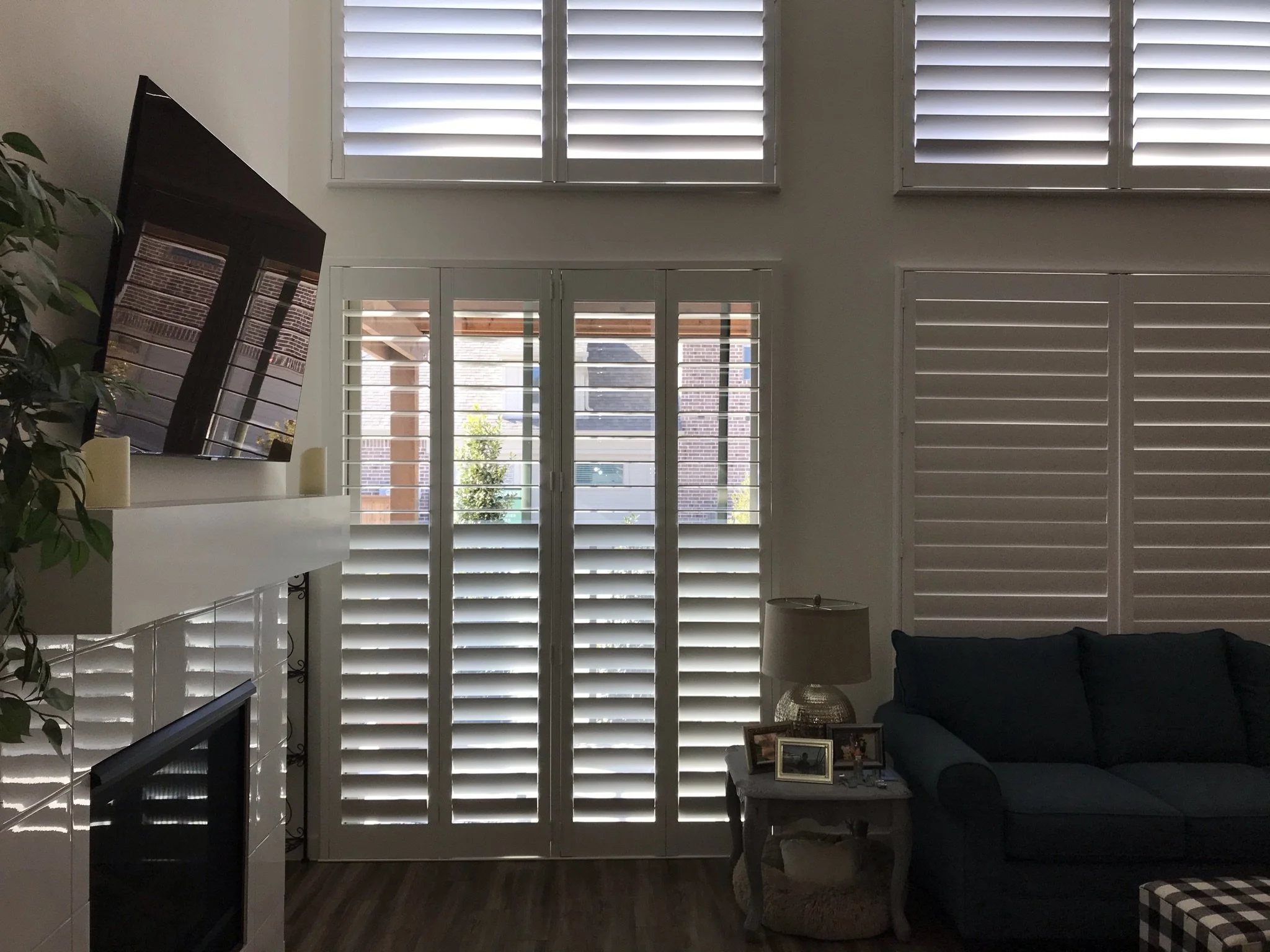 4 1/2" Clearview bi-fold wood shutter for sliding glass door, painted SW Pure White, 1 t-post, 4 panels.