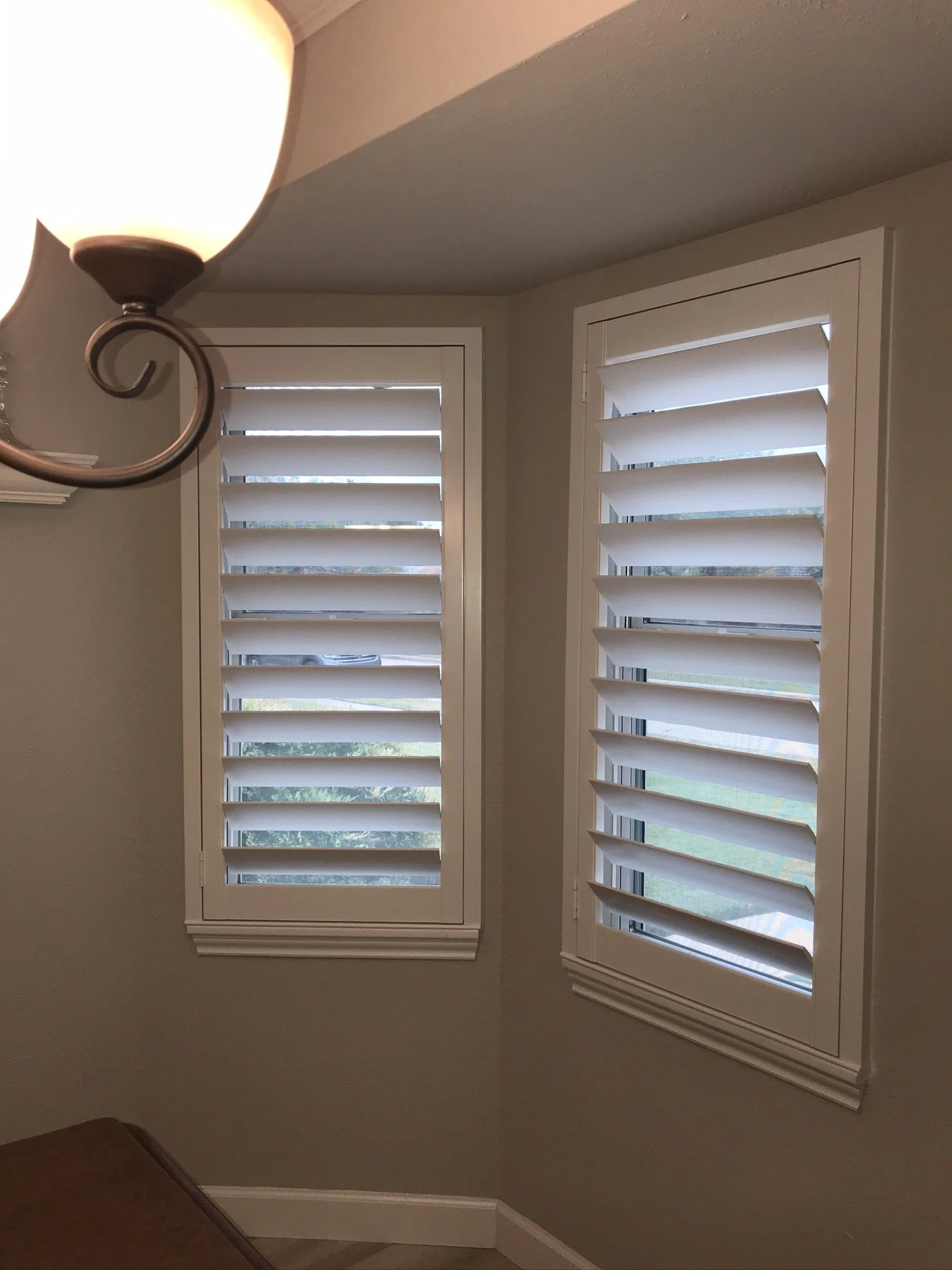 Custom wood plantation shutters with clearview (rear hidden tilt), 4 1/2" louvers, painted SW Pure White semi-gloss, 1.5" flat master frame and Z frame, no splits.  1 panel.
