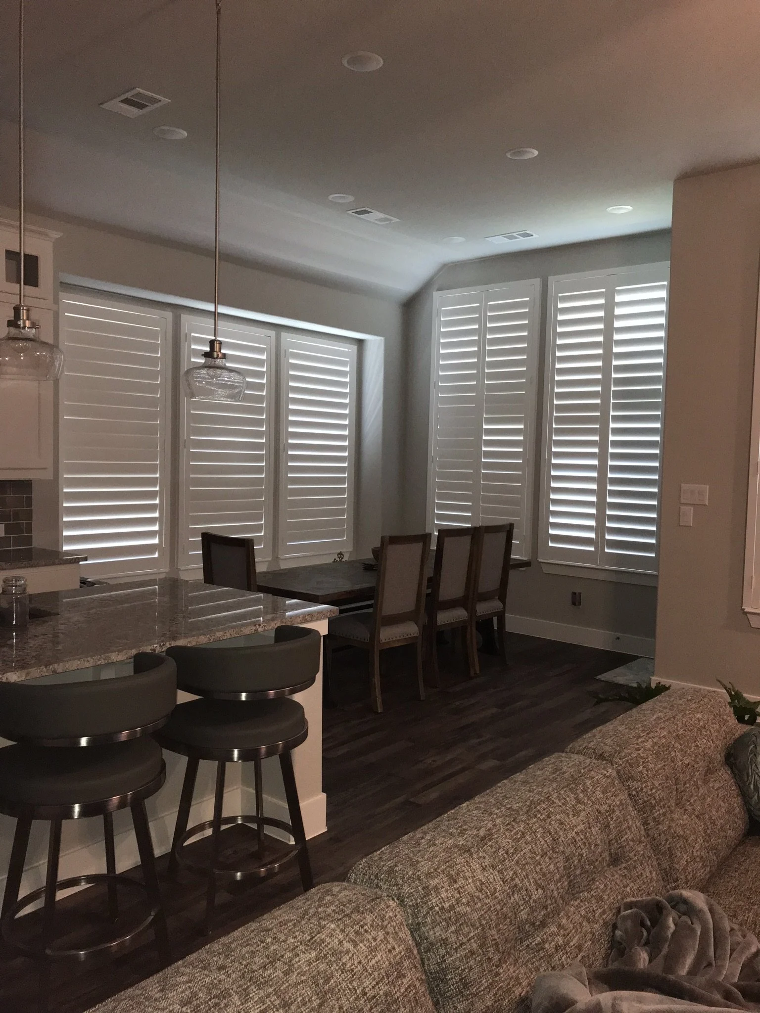 Wood shutters with rear hidden tilt, 4 1/2" louvers, SW Pure White, no divider rails.  