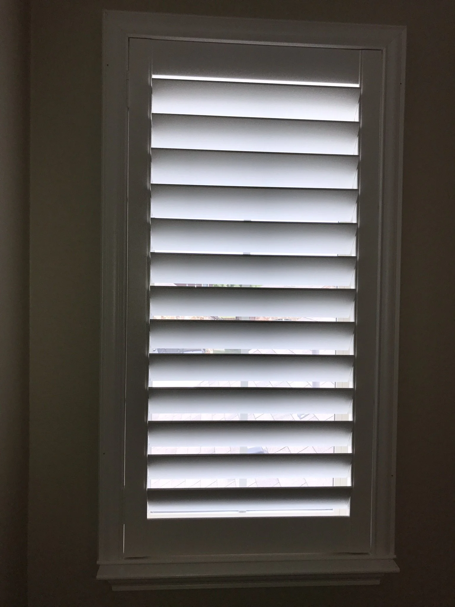 Custom wood shutters with Clearview (no tilt rods), Sherwin Williams Extra White, Belair master and z frame, 3 1/2" louvers, splits @ 50%, 1 panel.
