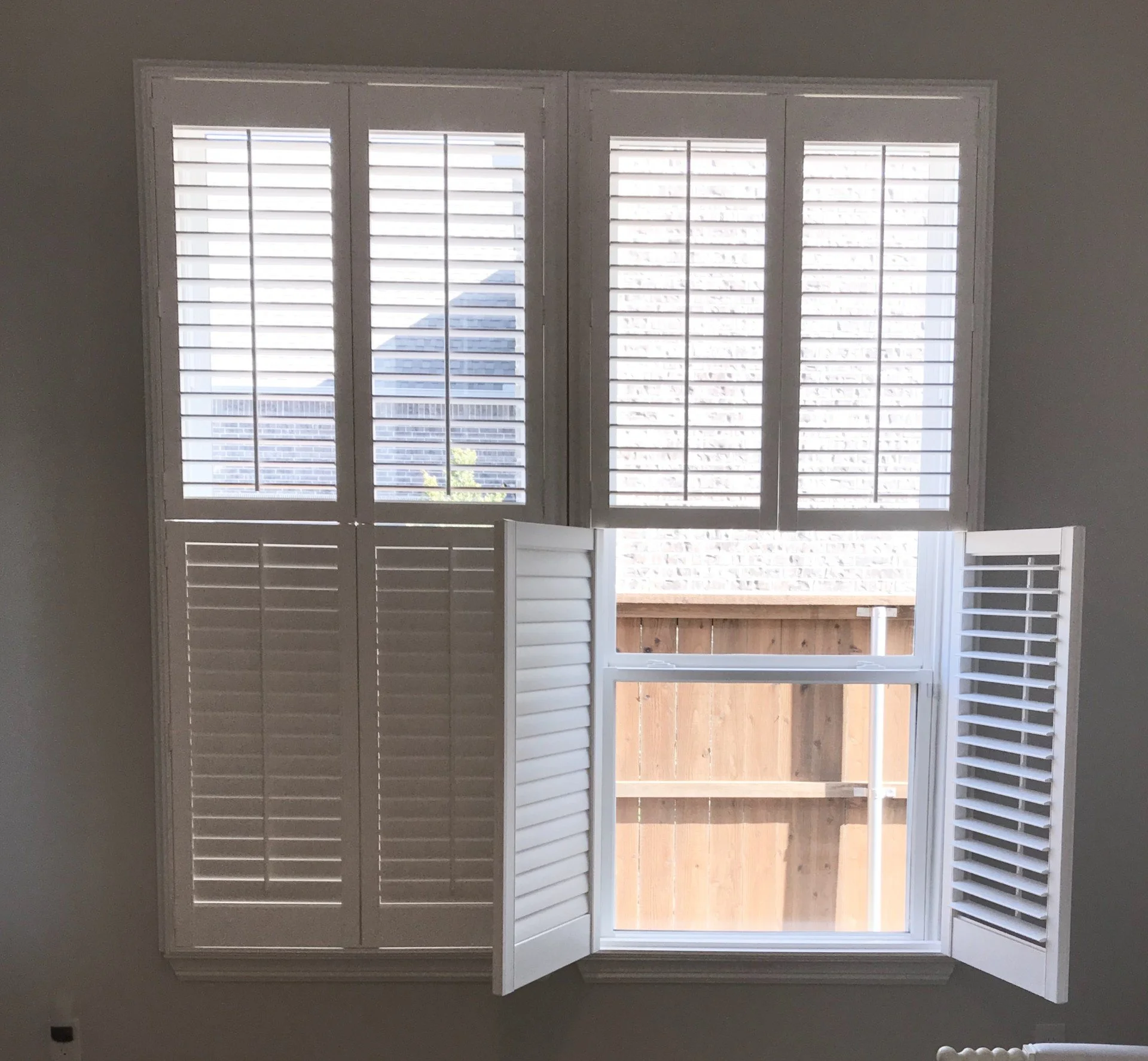 Hunter Douglas Palm Beach Polysatin Vinyl Shutters, double hung, bright white, deluxe casing frame, modern z frame, 2 1/2" louvers with front tilt, 2 panels.