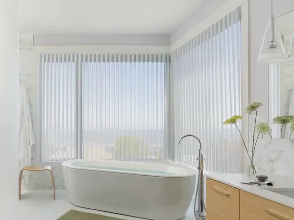 Hunter Douglas Luminette with PowerView motorization and light filtering fabric.