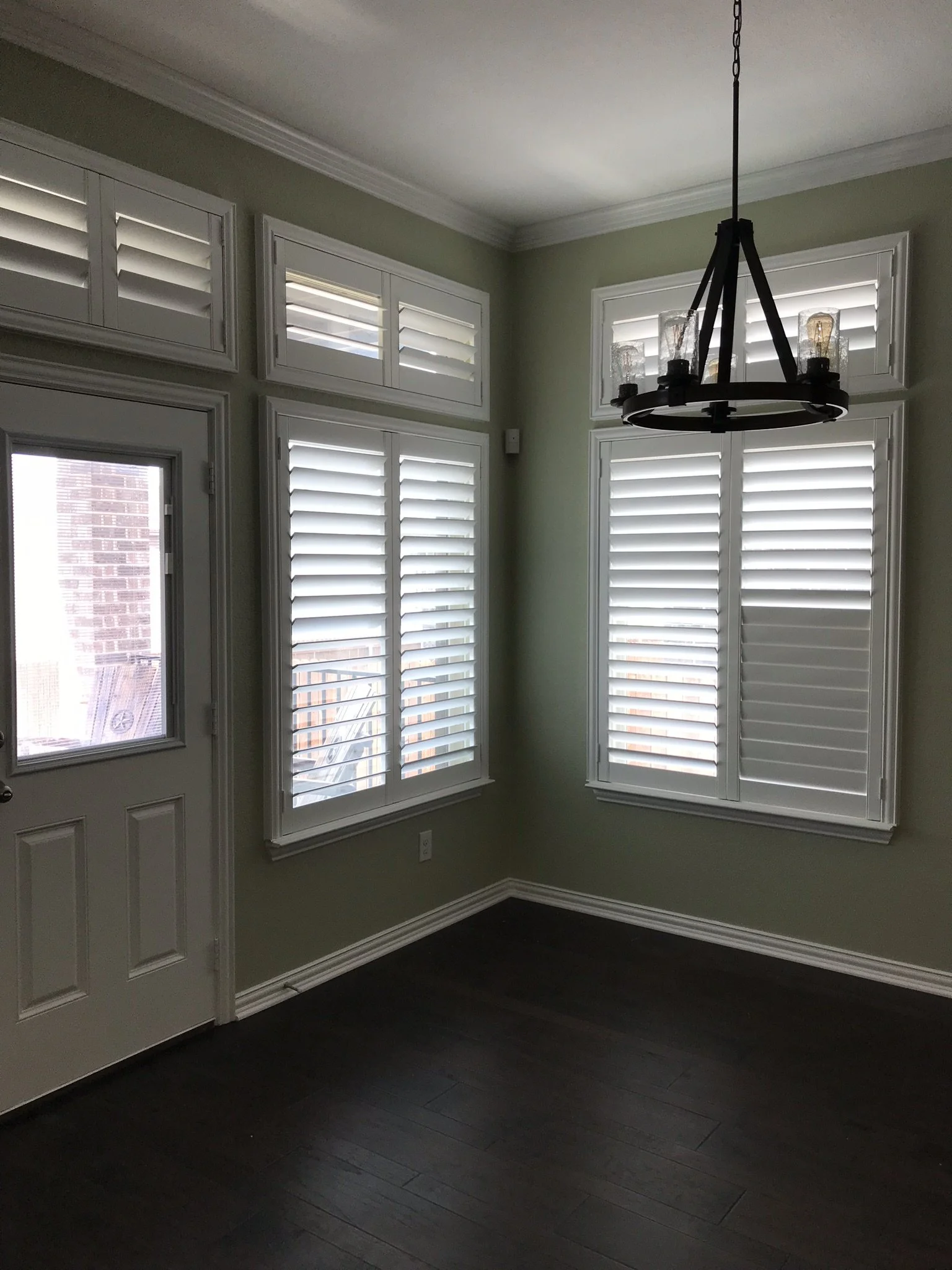 Custom wood shutters with Clearview (no tilt rods), Sherwin Williams Extra White, Belair master and z frame, 3 1/2" louvers, splits @ 50%, 2 panels, 2 panel transoms.