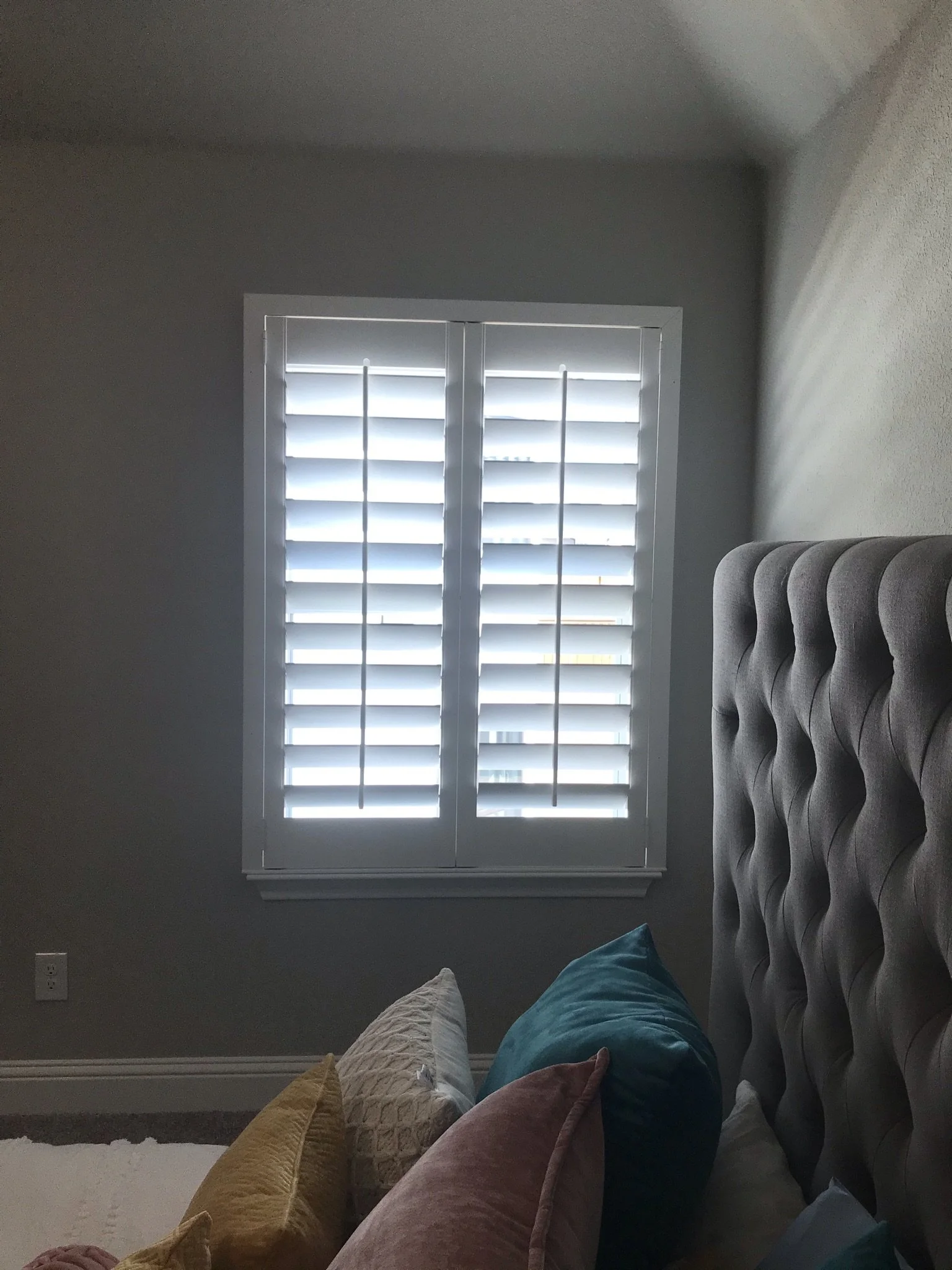 Custom wood shutters with front tilt rods, 4 1/2" louvers, painted, no divider rail.