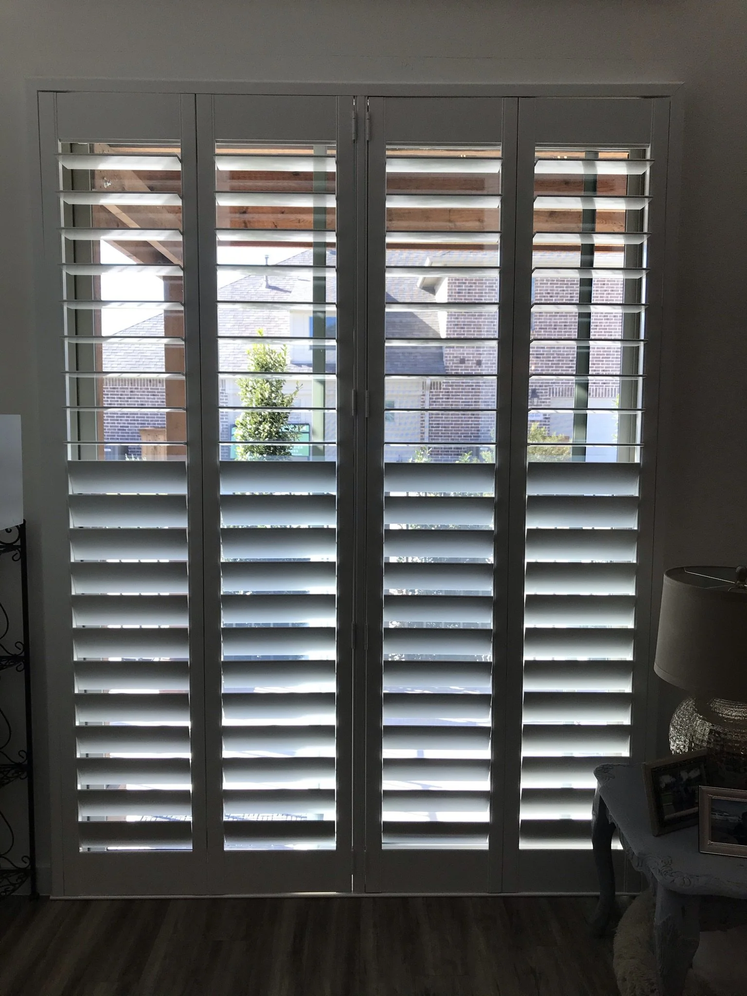 4 1/2" Clearview bi-fold wood shutter for sliding glass door, painted SW Pure White, 1 t-post, 4 panels.