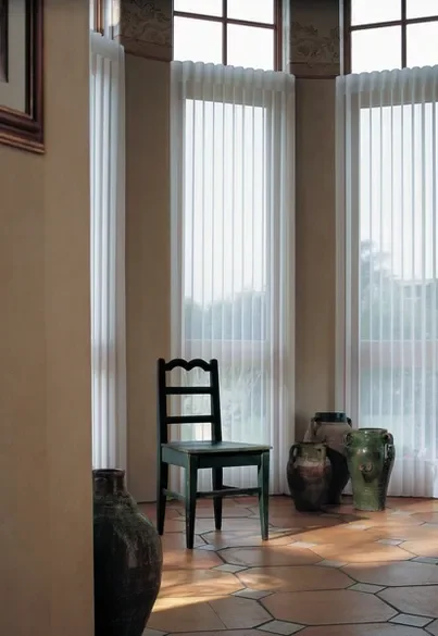 Hunter Douglas Luminette with PowerView motorization and light filtering fabric.