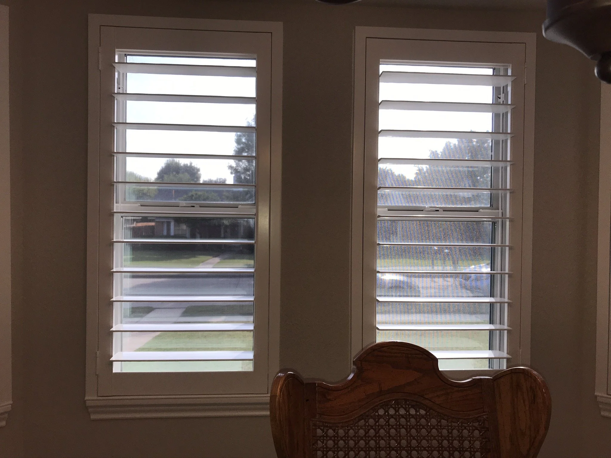 Custom wood plantation shutters with clearview (rear hidden tilt), 4 1/2" louvers, painted SW Pure White semi-gloss, 1.5" flat master frame and Z frame, no splits.  1 panel.