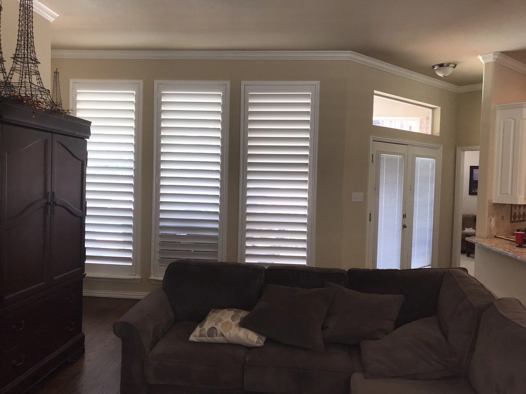 Custom Wood Shutters with Clearview (no tilt rod), 4 1/2" louvers, painted SW Extra White semi-gloss, San Antonio z frame, no divider rails, rear tilt split, 1 panel each.
