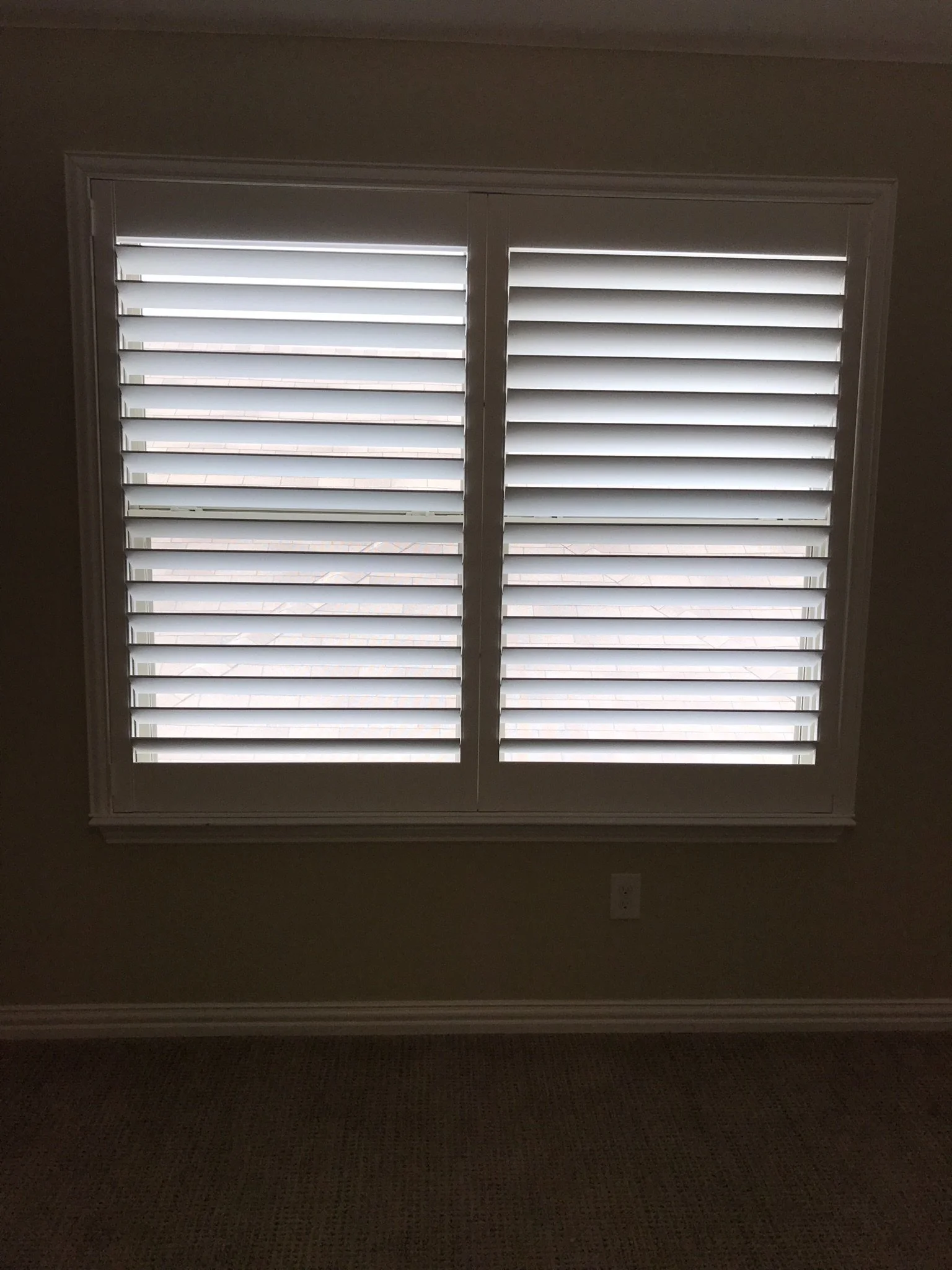 Custom wood shutters with Clearview (no tilt rods), Sherwin Williams Extra White, Belair master and z frame, 3 1/2" louvers, splits @ 50%, 2 panels.