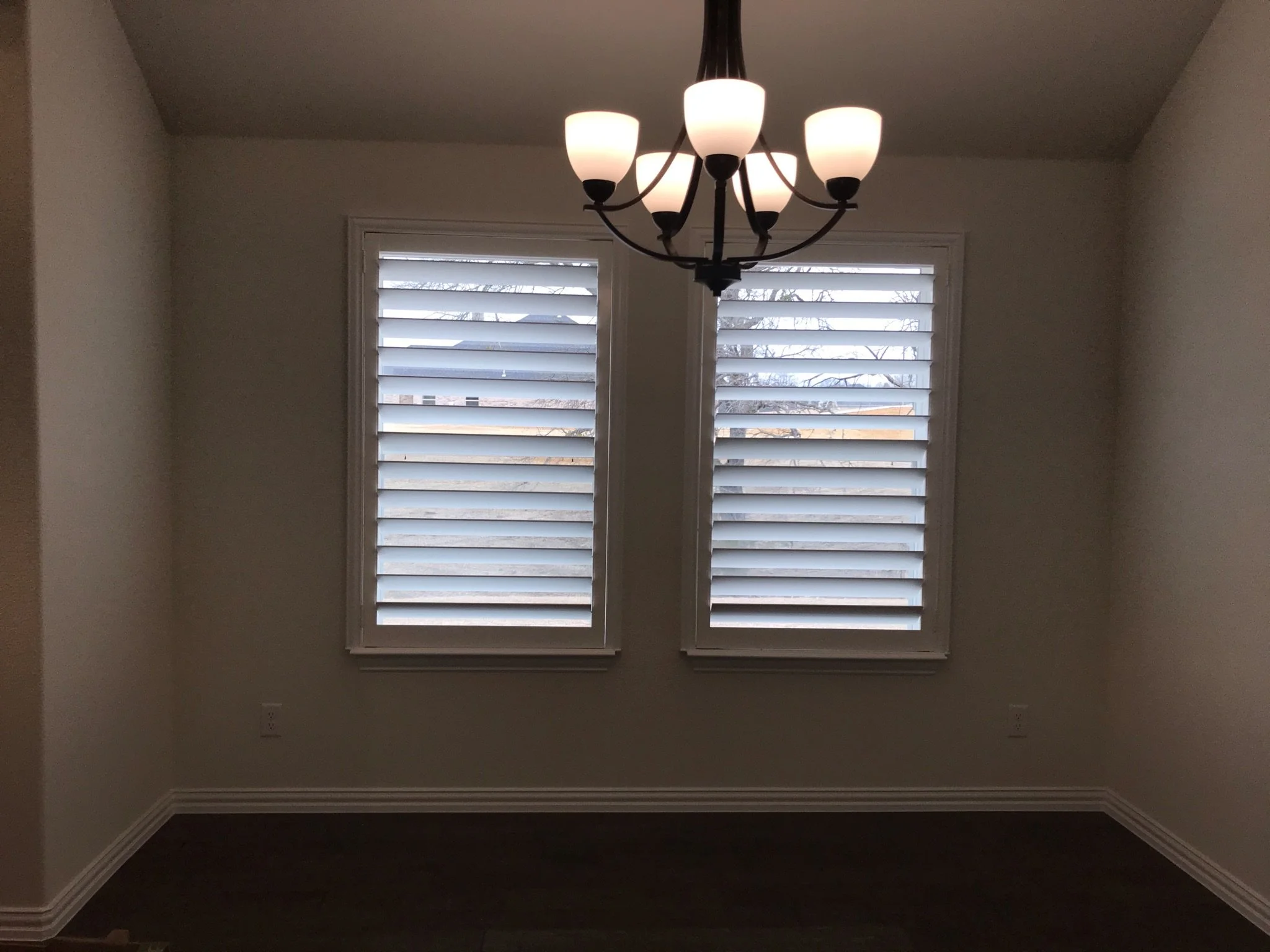 Custom wood shutters with clearview (rear hidden tilt), 4 1/2" louvers, painted, no divider rails.