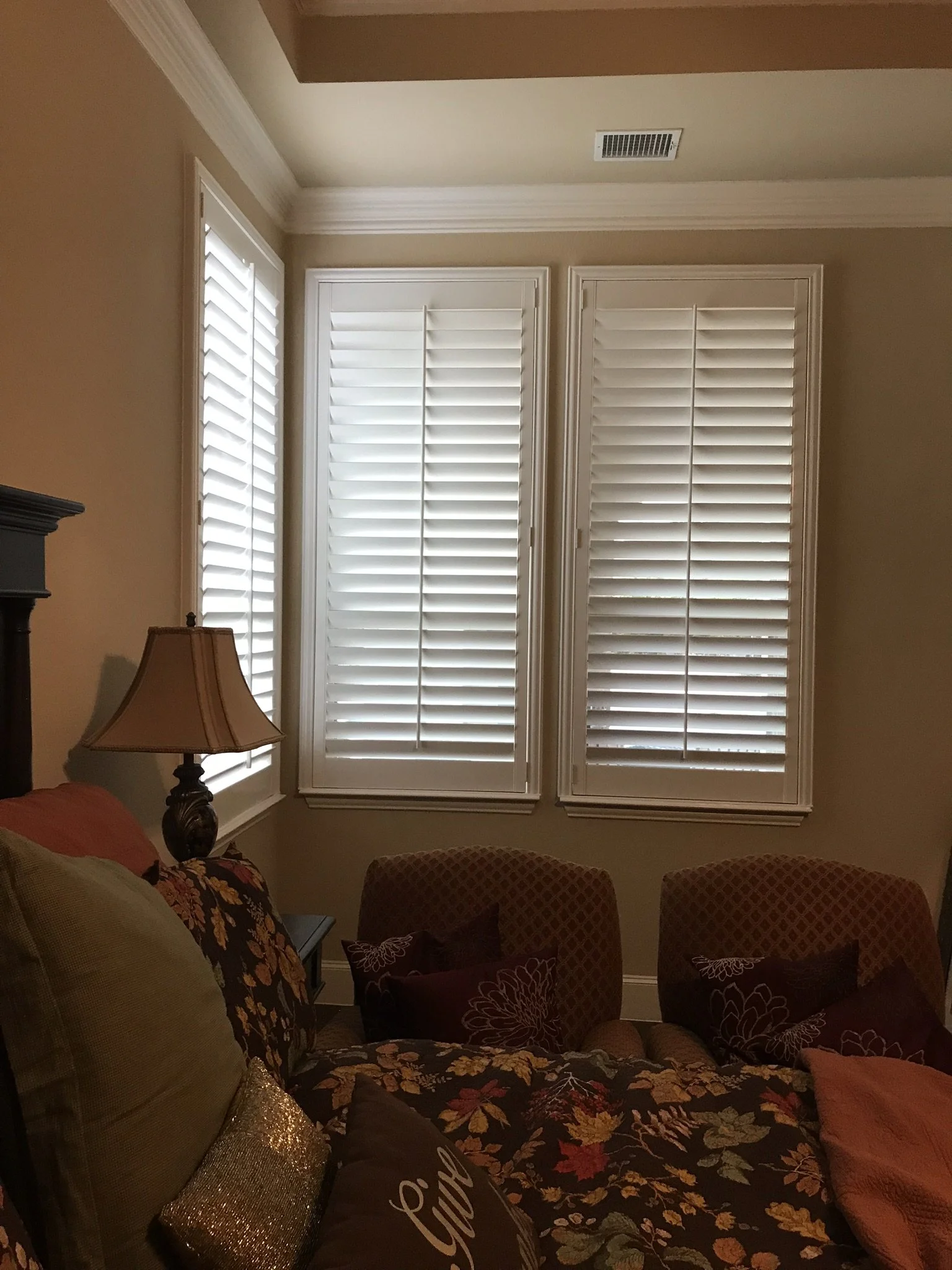 Custom painted wood shutters, 3 1/2" louvers, front tilt rod, painted alabaster to match sills, 1 panel, master frame.