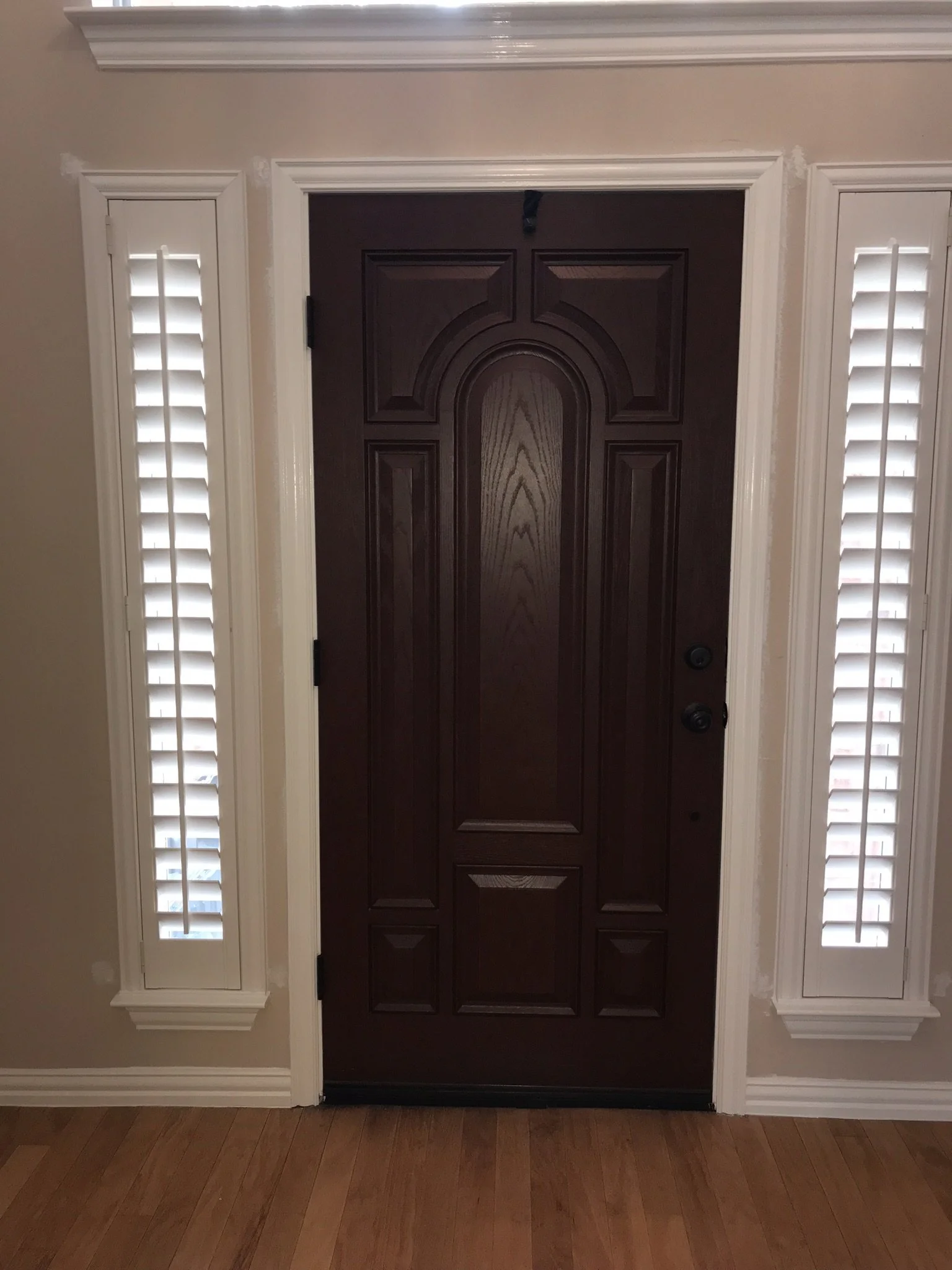 Custom Wood Plantation Shutters, 3 1/2" louvers, painted Sherwin Williams match to Behr Swiss Coffee, no divider rails, front tilt rod, Belair Z frame, 1 panel each, hinged left, hinged right, for sidelites.