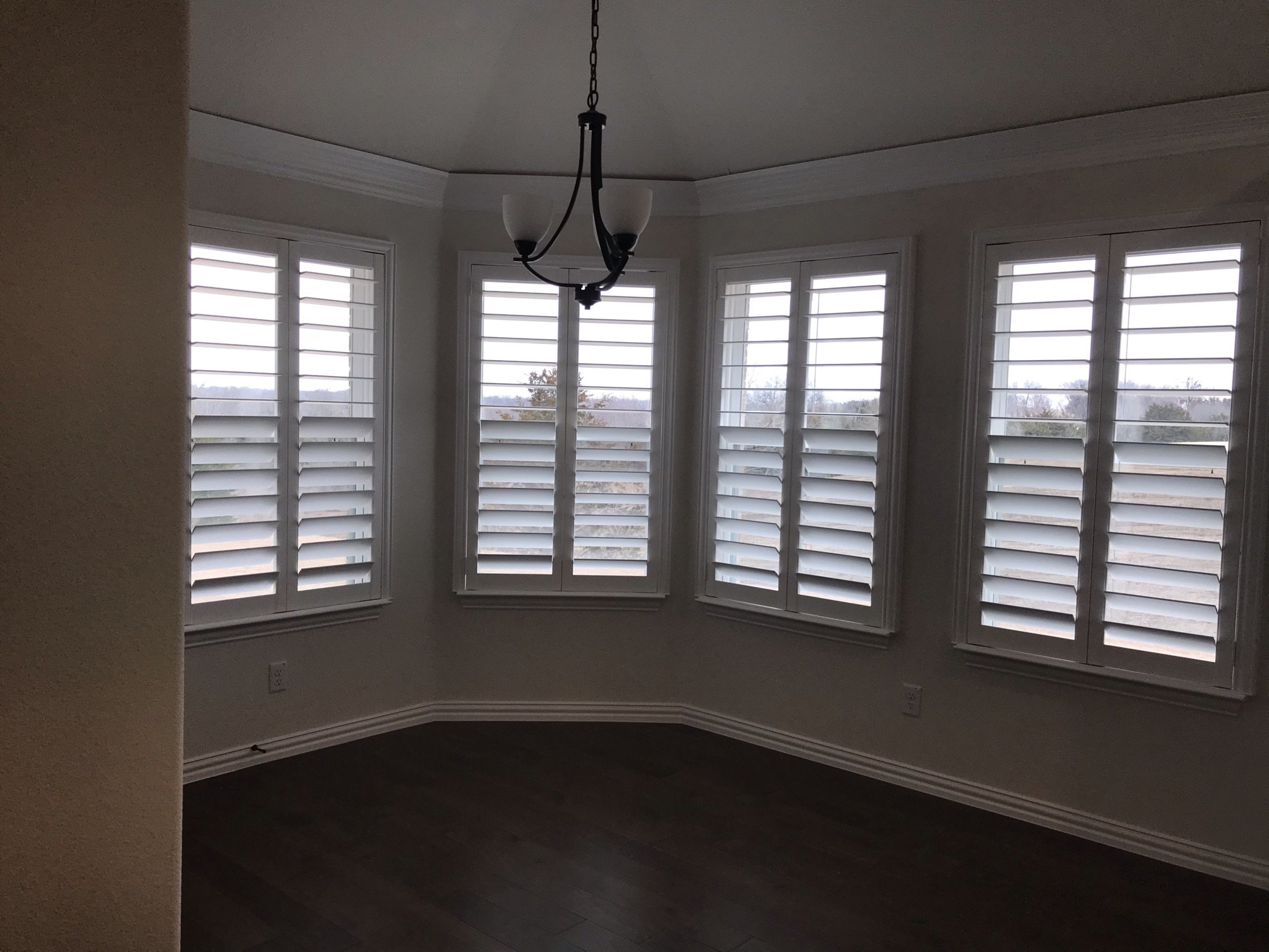 Custom wood shutters with clearview (rear hidden tilt), 4 1/2" louvers, painted, no divider rails.