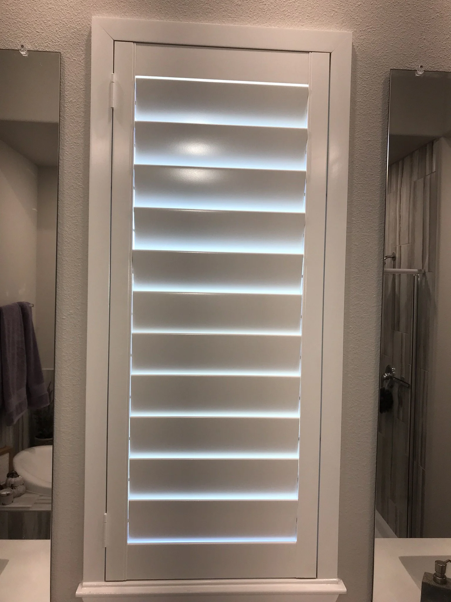 Wood shutters with rear hidden tilt, 4 1/2" louvers, SW Pure White, no divider rails.