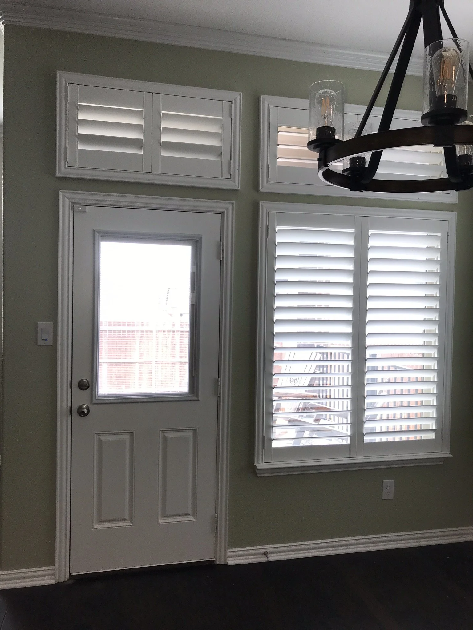 Custom wood shutters with Clearview (no tilt rods), Sherwin Williams Extra White, Belair master and z frame, 3 1/2" louvers, splits @ 50%, 2 panels, 2 panel transoms.