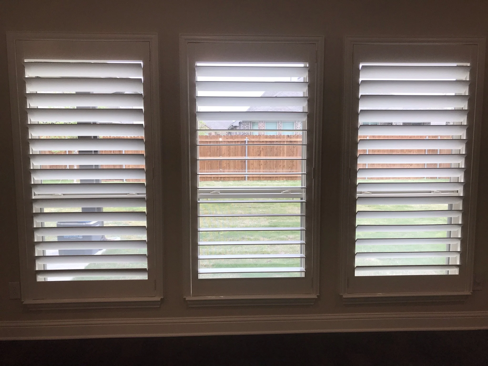 Custom Wood Shutters with Clearview (no tilt rod), 4 1/2" louvers, no divider rails, splits @ 50%, painted, 1 panel.