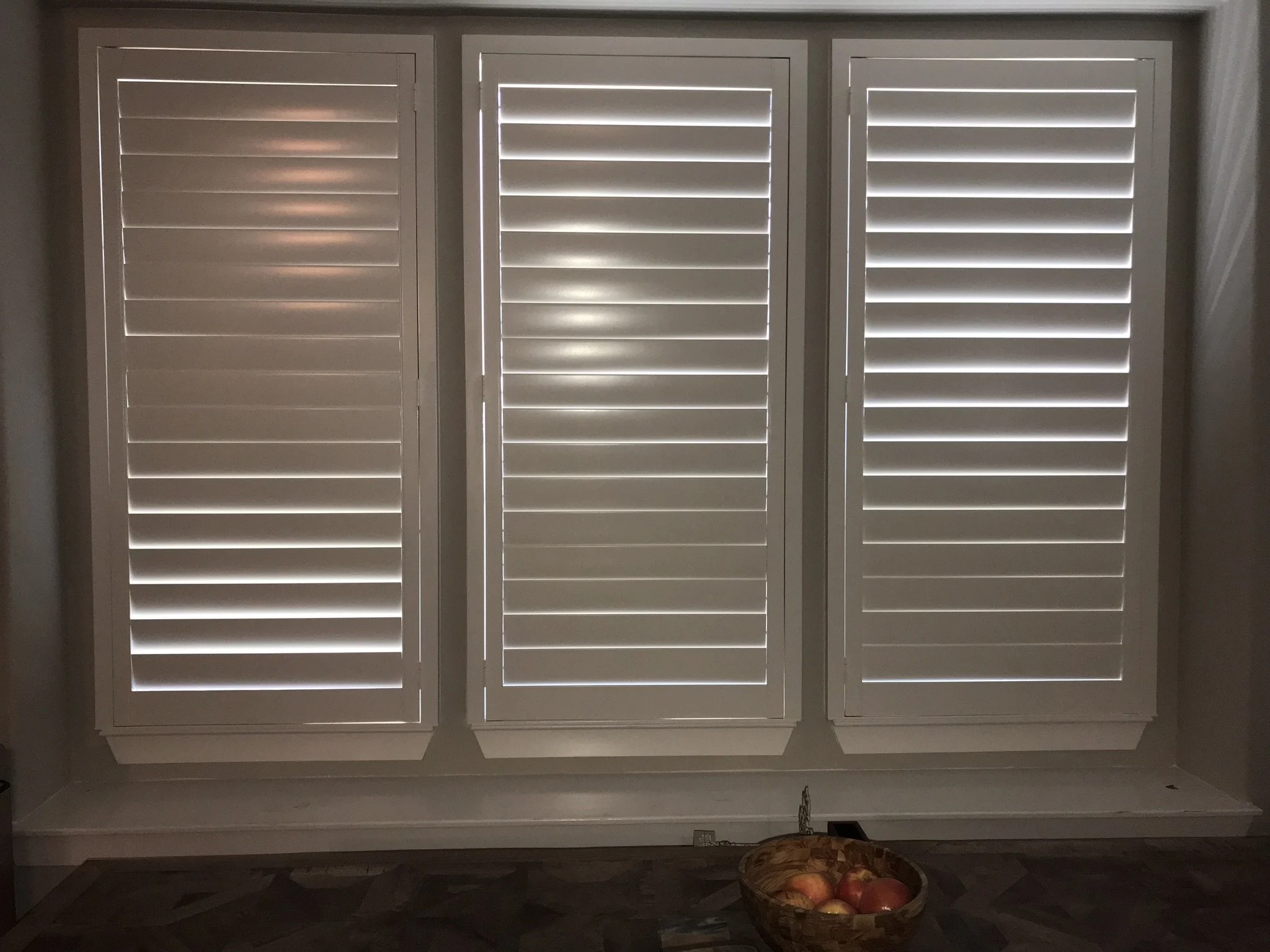 Wood shutters with rear hidden tilt, 4 1/2" louvers, SW Pure White, no divider rails.