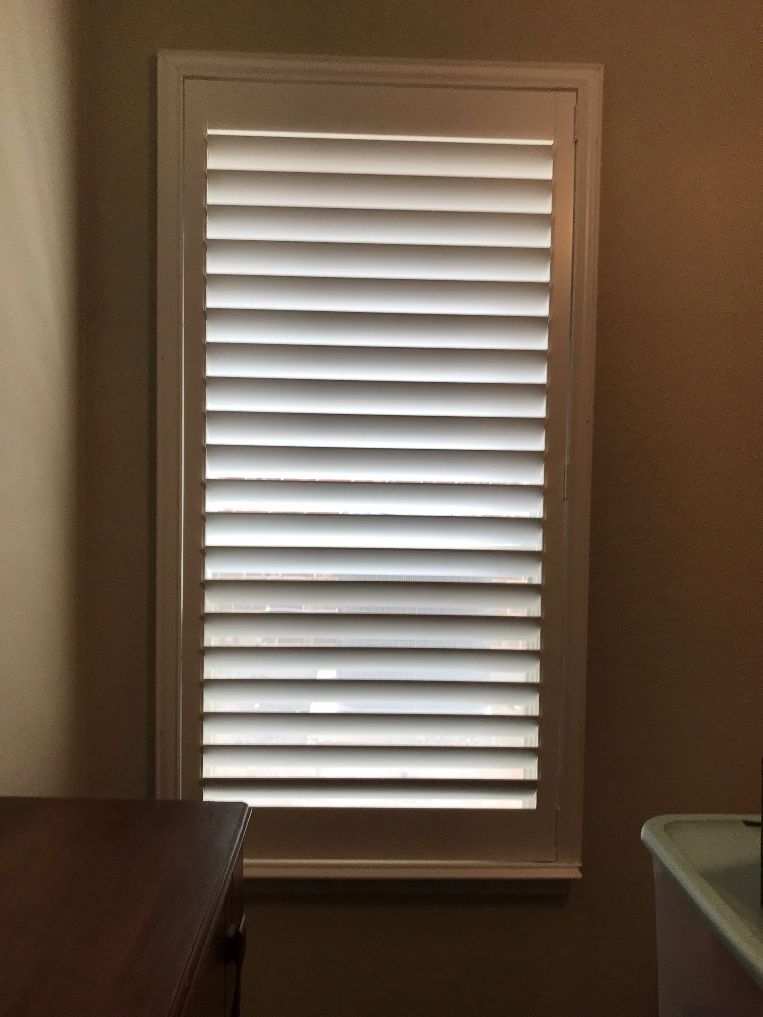 Custom wood shutters with Clearview (no tilt rods), Sherwin Williams Extra White, Belair master and z frame, 3 1/2" louvers, splits @ 50%, 1 panel.