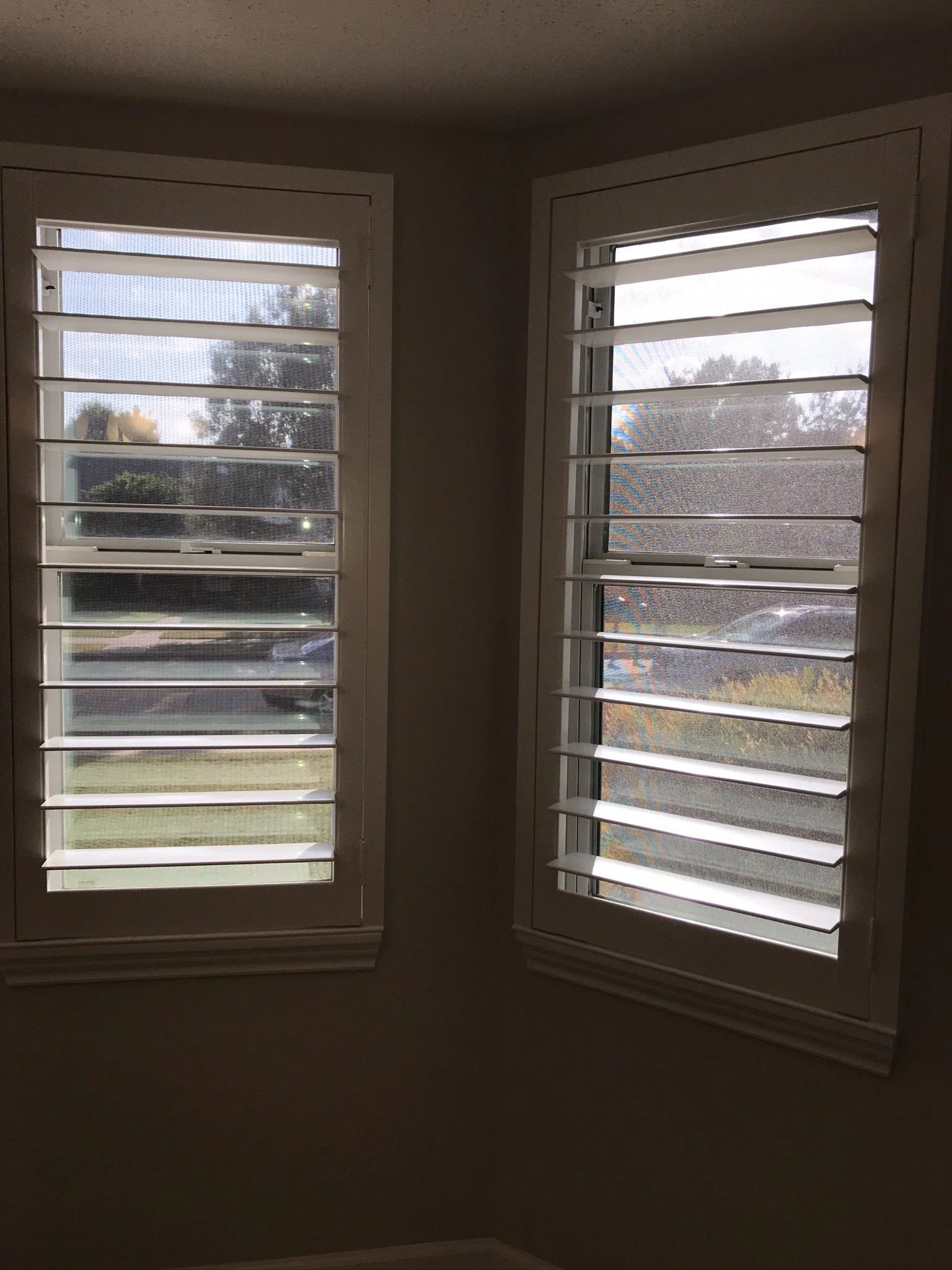Custom wood plantation shutters with clearview (rear hidden tilt), 4 1/2" louvers, painted SW Pure White semi-gloss, 1.5" flat master frame and Z frame, no splits.  1 panel.