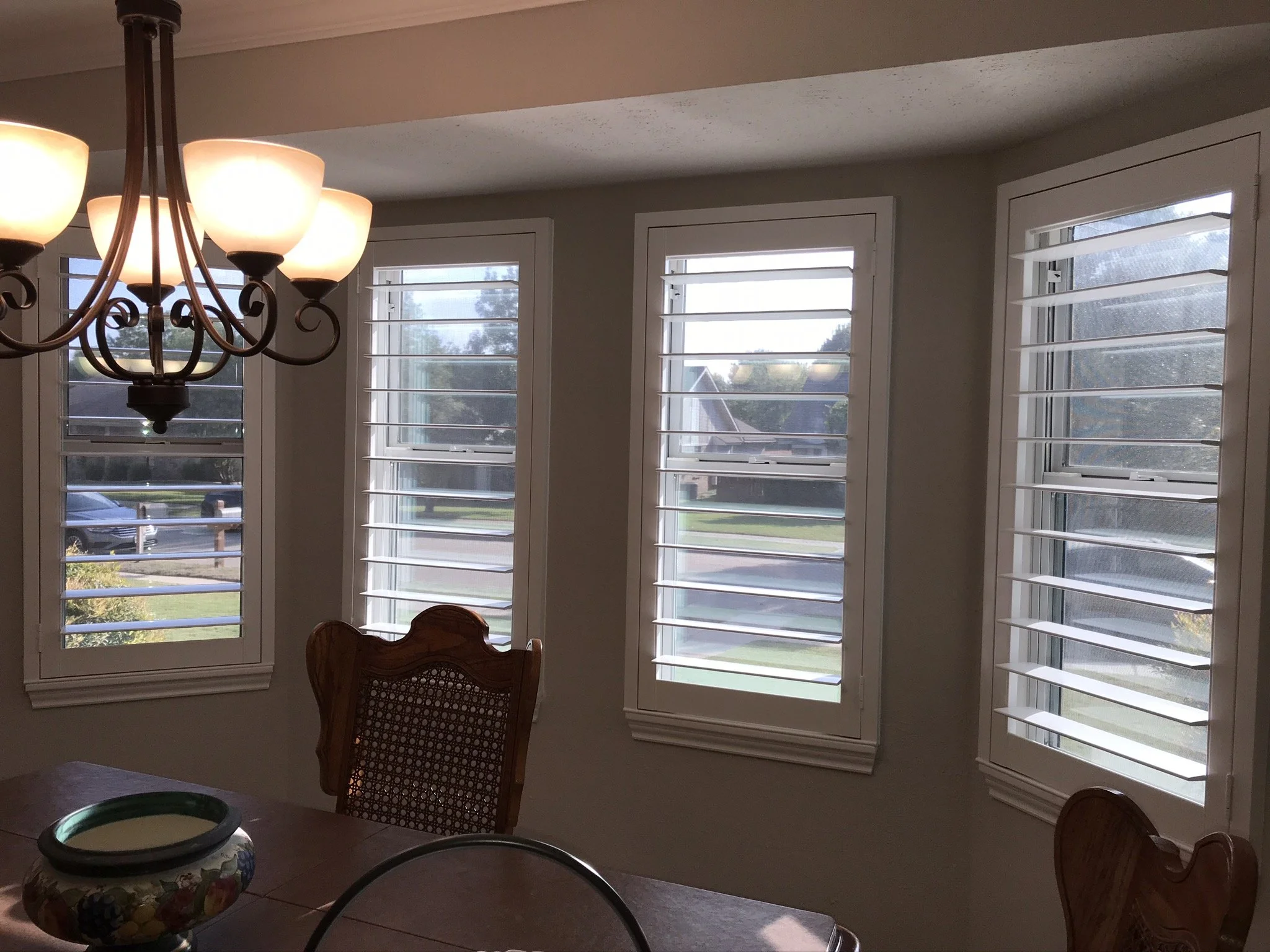 Custom wood plantation shutters with clearview (rear hidden tilt), 4 1/2" louvers, painted SW Pure White semi-gloss, 1.5" flat master frame and Z frame, no splits.  1 panel.