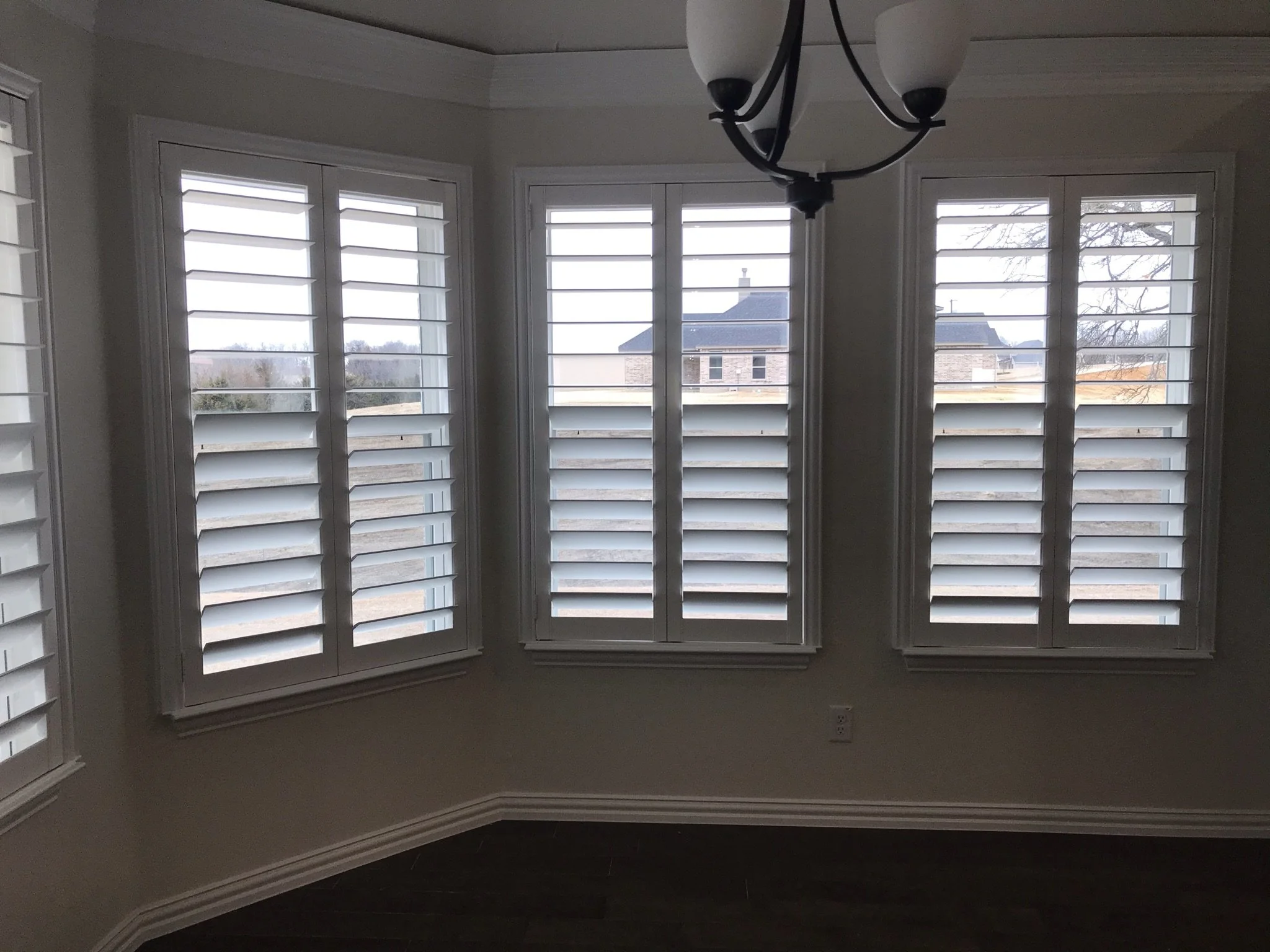 Custom wood shutters with clearview (rear hidden tilt), 4 1/2" louvers, painted, no divider rails.
