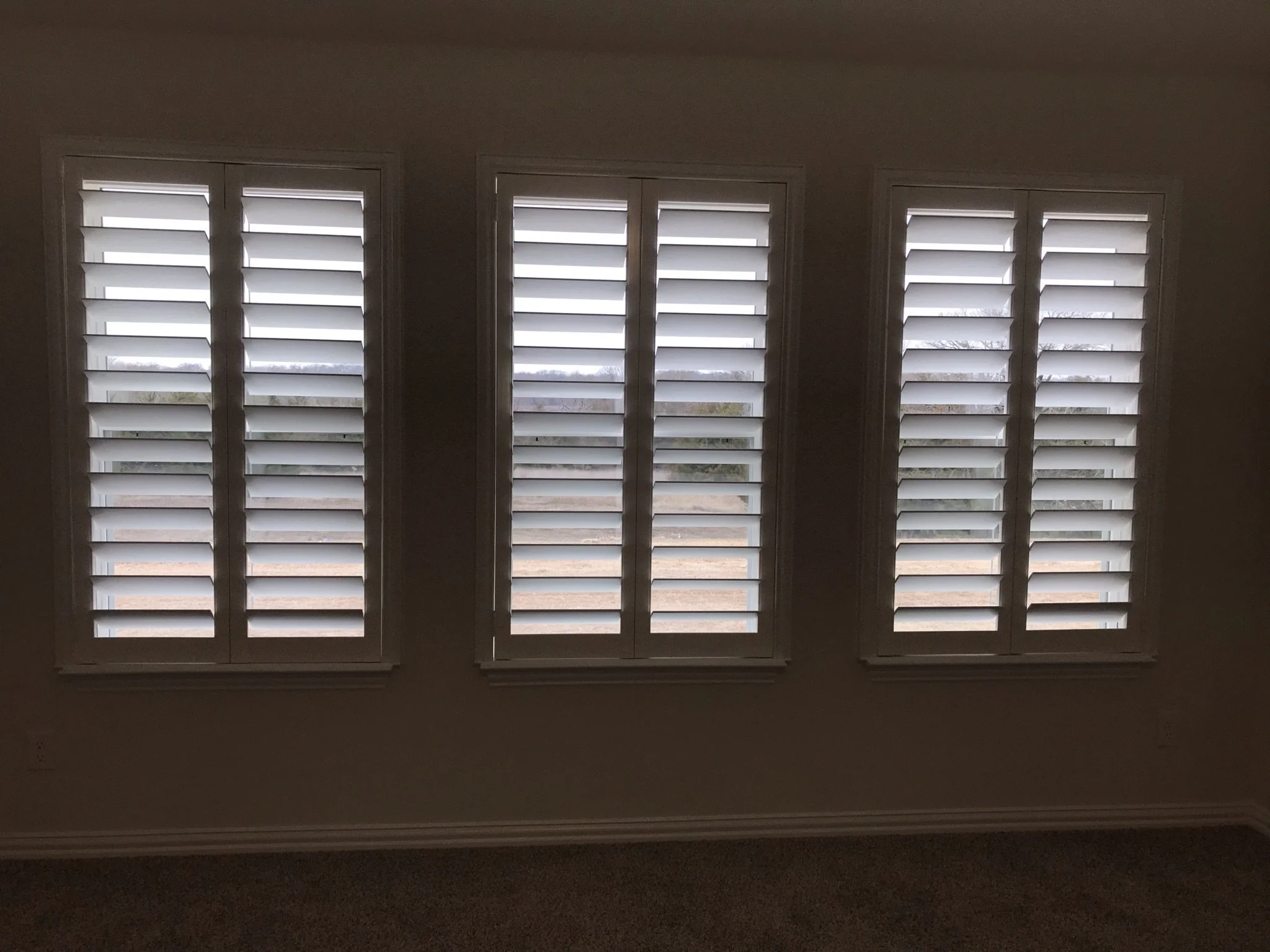 Custom wood shutters with clearview (rear hidden tilt), 4 1/2" louvers, painted, no divider rails.