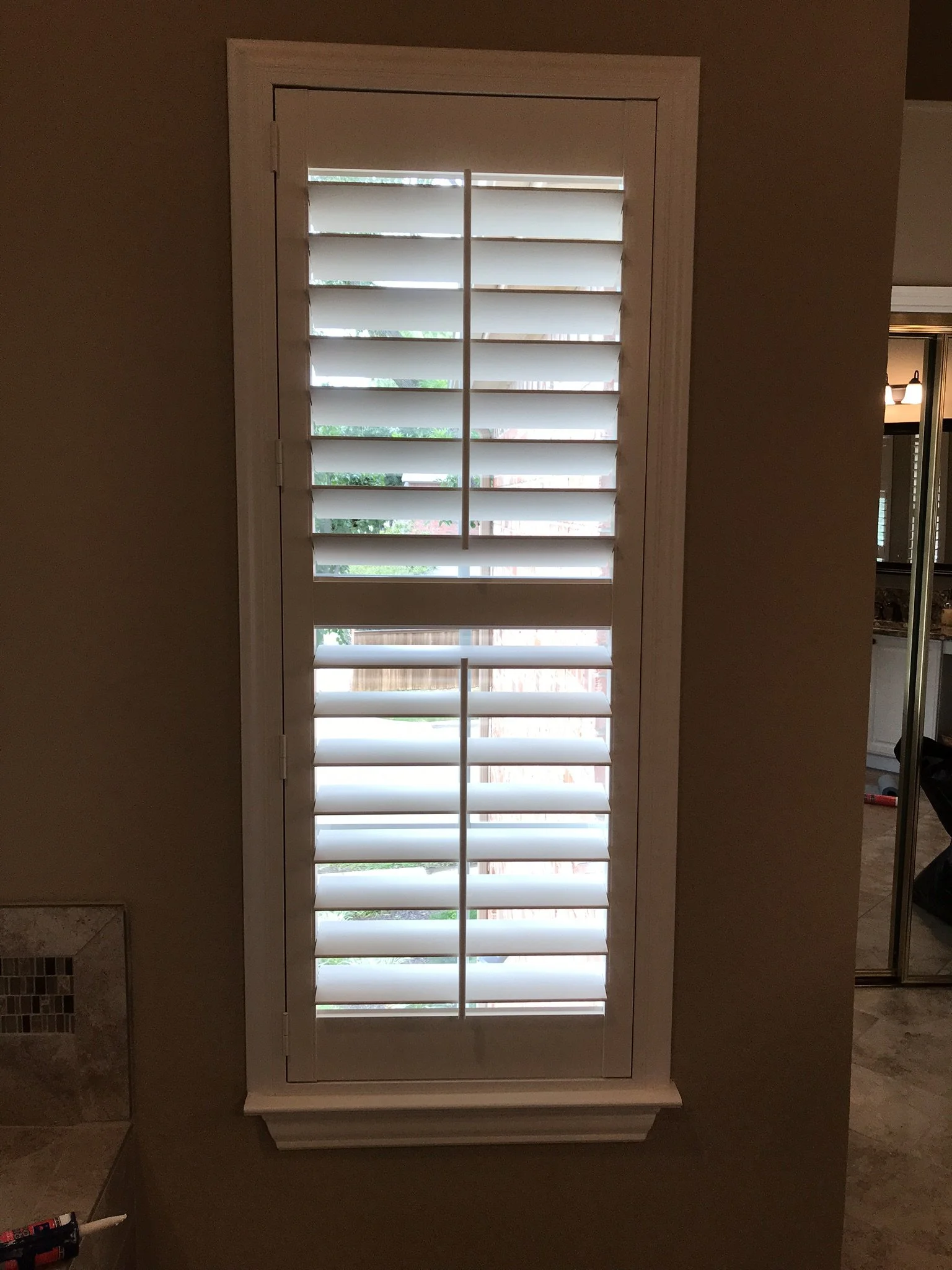 Hunter Douglas Palm Beach Polysatin Vinyl Shutters, 3 1/2" louvers, White Silk, divider rails, front tilt rods, Colonial Z frame, 1 panel and 2 panels, faux shutters.