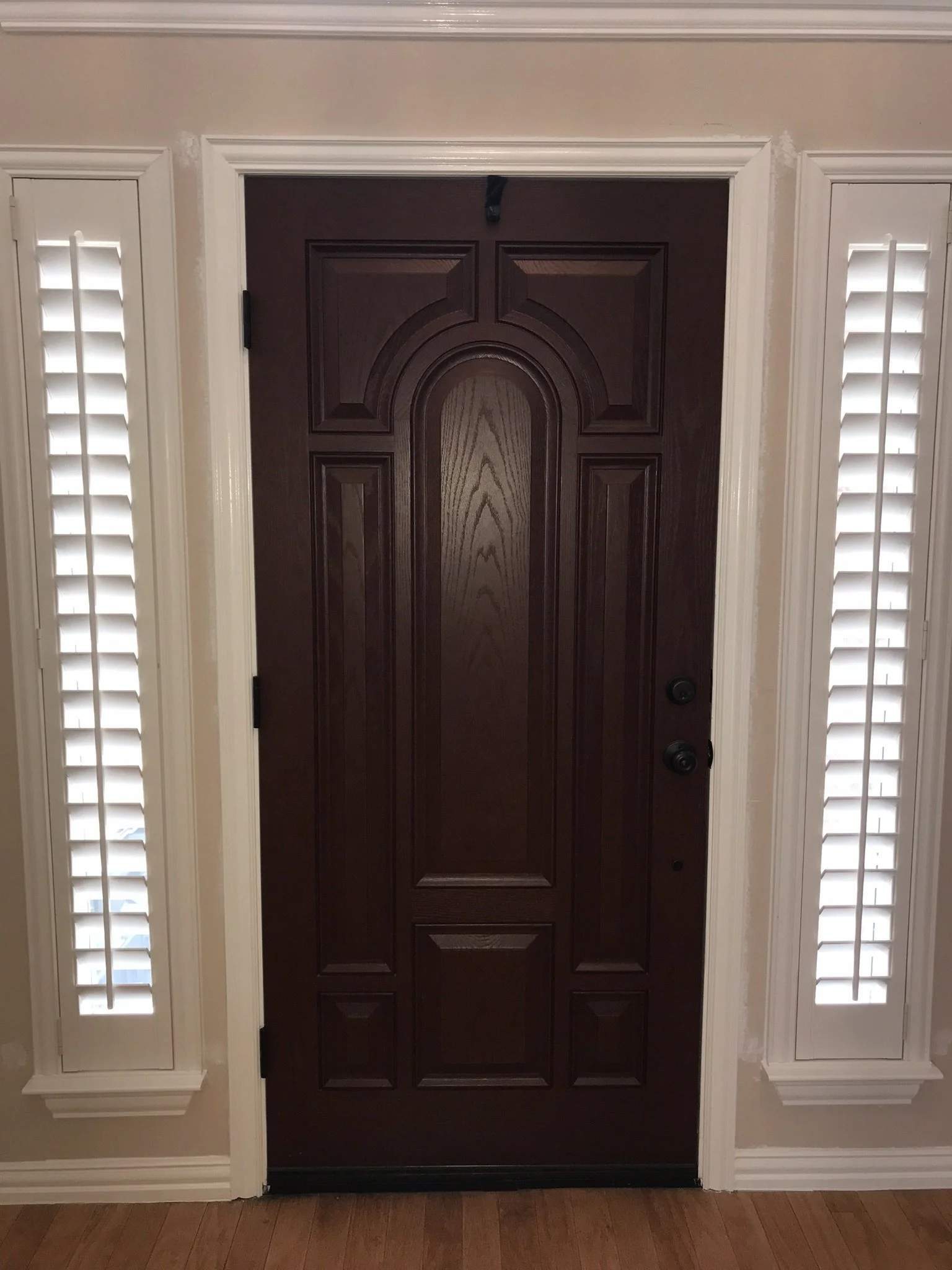 Custom Wood Plantation Shutters, 3 1/2" louvers, painted Sherwin Williams match to Behr Swiss Coffee, no divider rails, front tilt rod, Belair Z frame, 1 panel each, hinged left, hinged right, for sidelites.