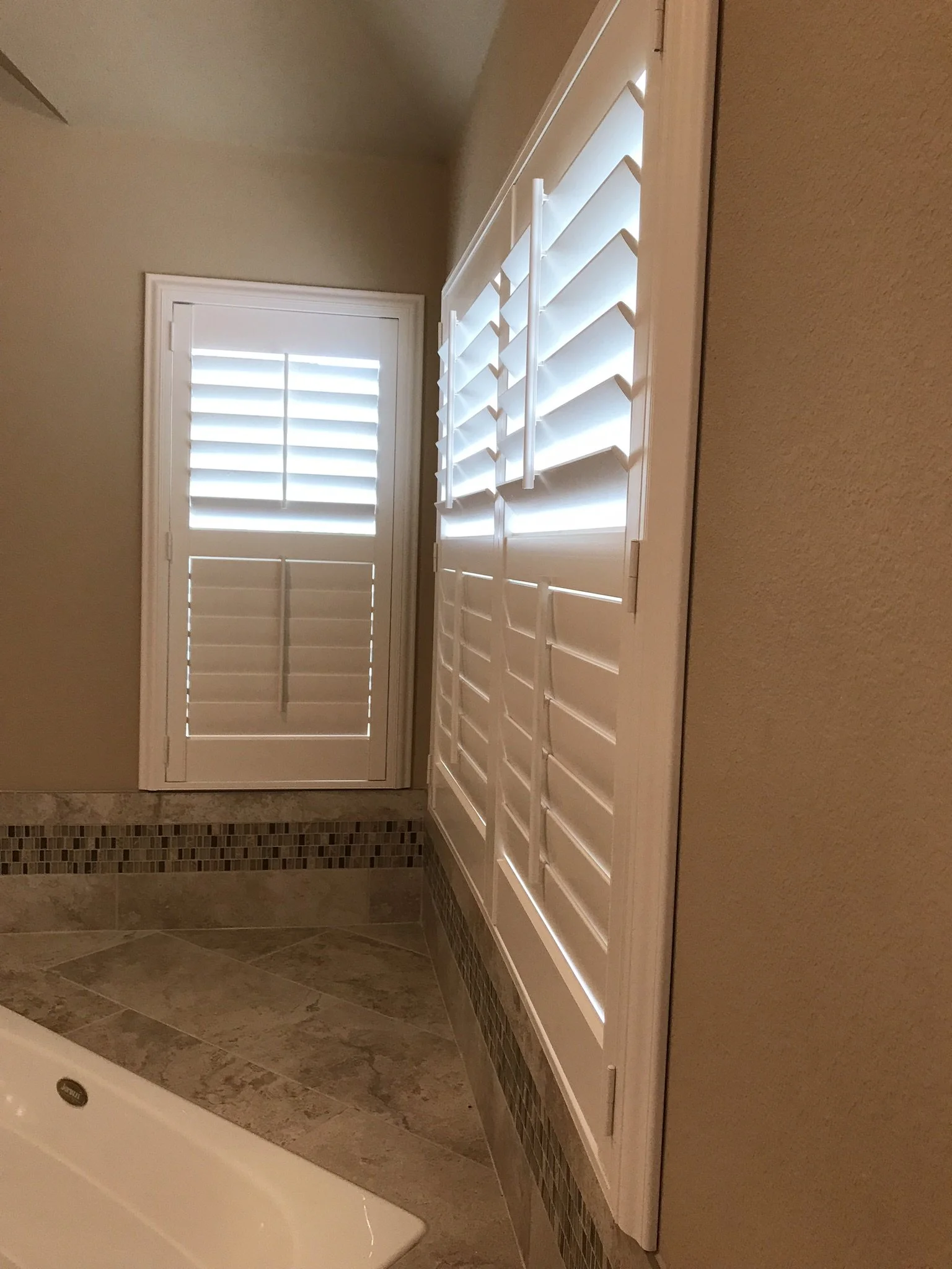 Hunter Douglas Palm Beach Polysatin Vinyl Shutters, 3 1/2" louvers, White Silk, divider rails, front tilt rods, Colonial Z frame, 1 panel and 2 panels, faux shutters.