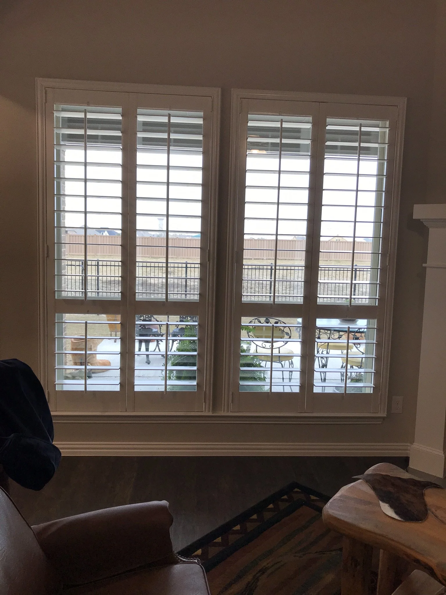 Wood Shutters with tilt rods, painted white, flat master frame, divider rails, 2 panels.