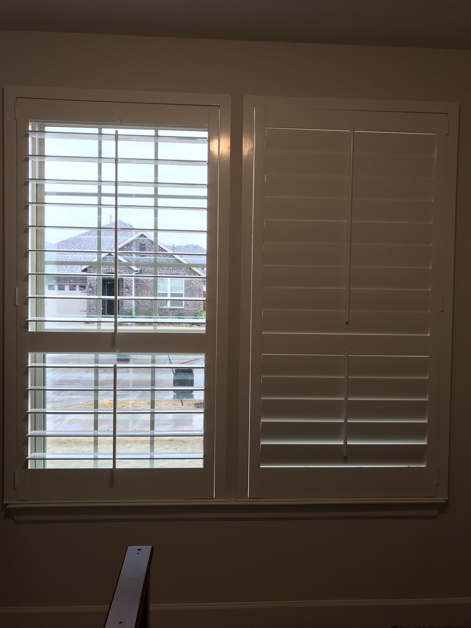 Wood Shutters with tilt rods, painted white, flat master frame, divider rails, 1 panel.