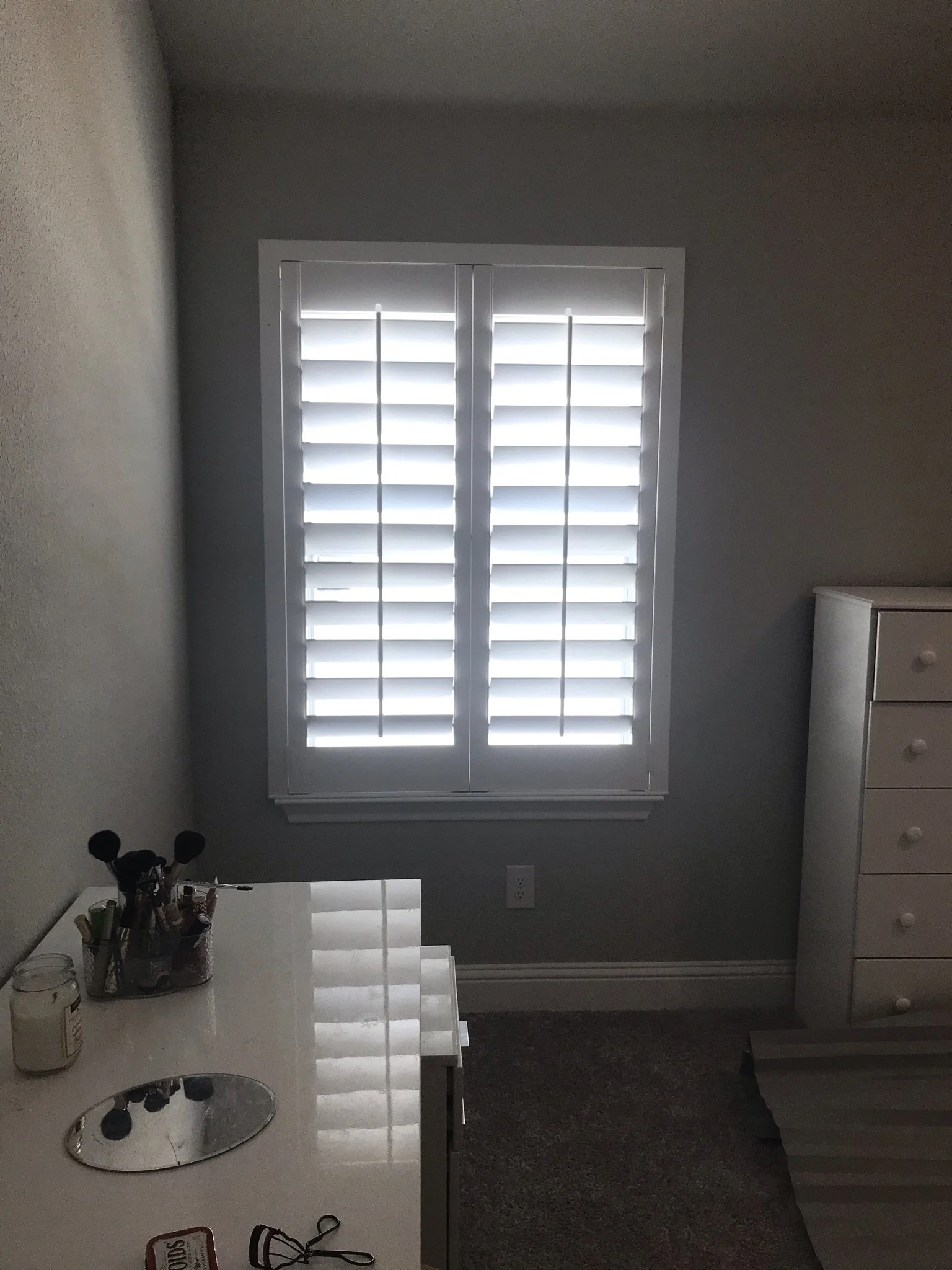Custom wood shutters with front tilt rods, 4 1/2" louvers, painted, no divider rail.
